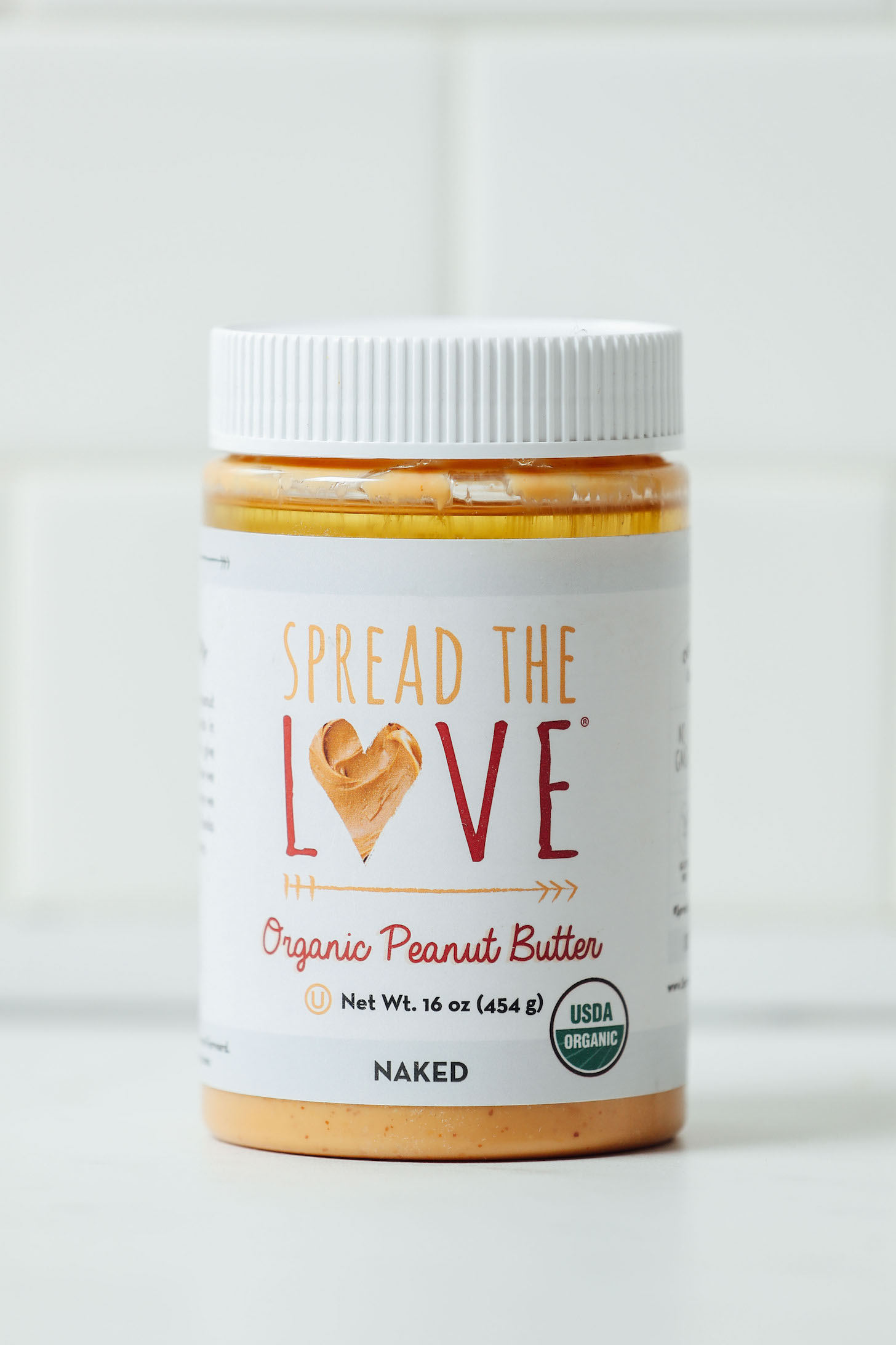 Jar of Spread the Love Peanut Butter for our review of the best brands of peanut butter