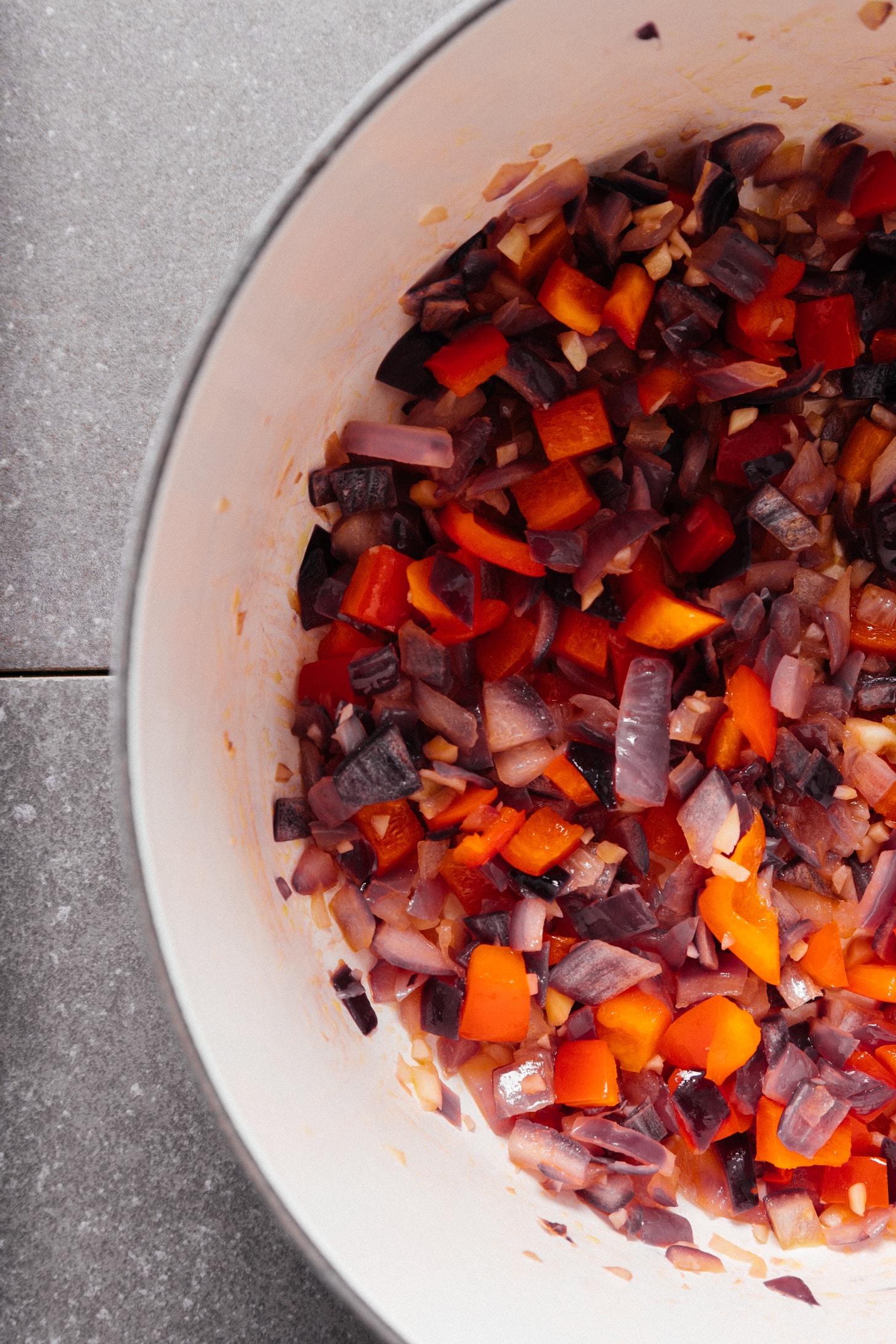 Sautéing onions and peppers to make our simple West African Peanut Stew recipe made with chickpeas