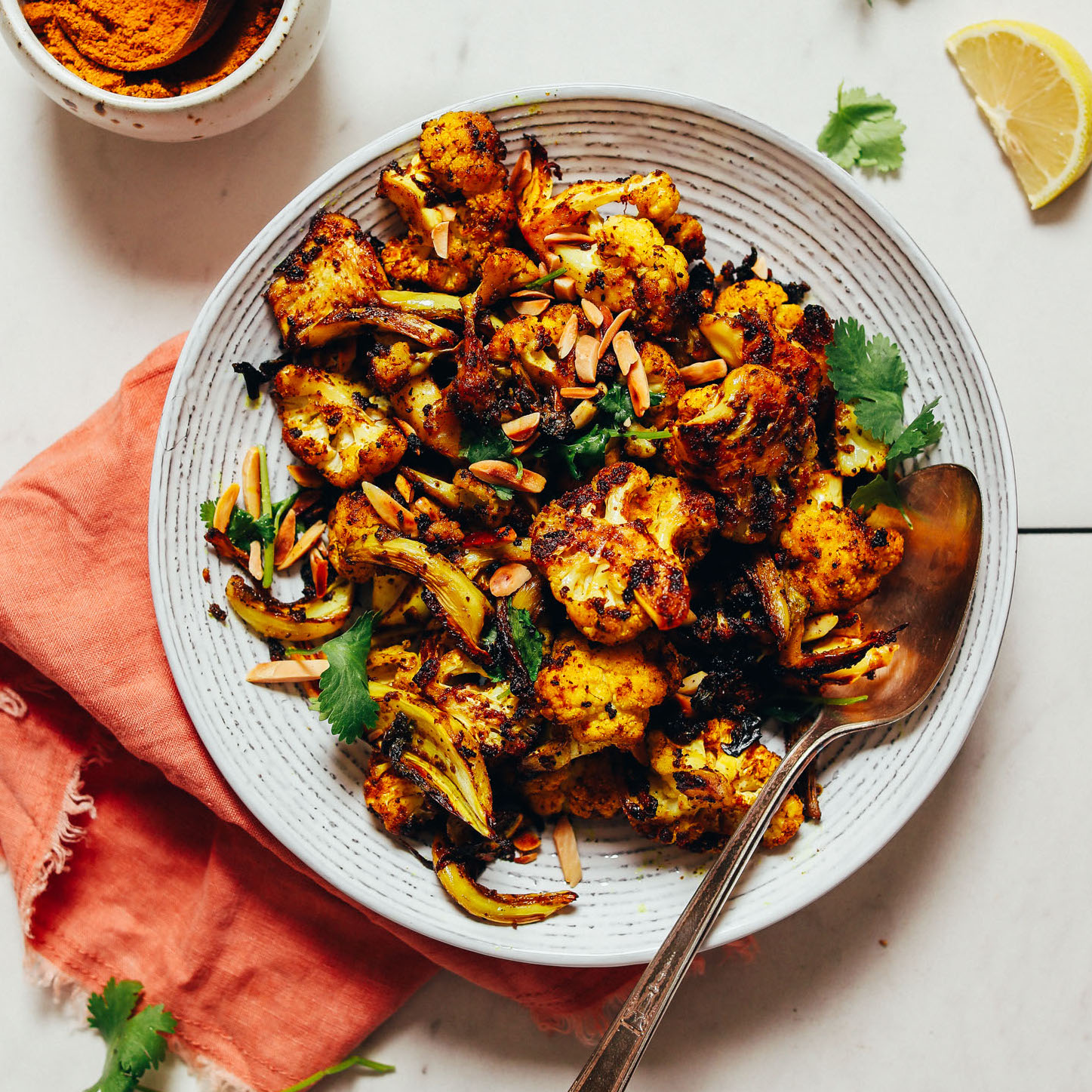 Bowl of Crispy Baked Cauliflower made with curry powder