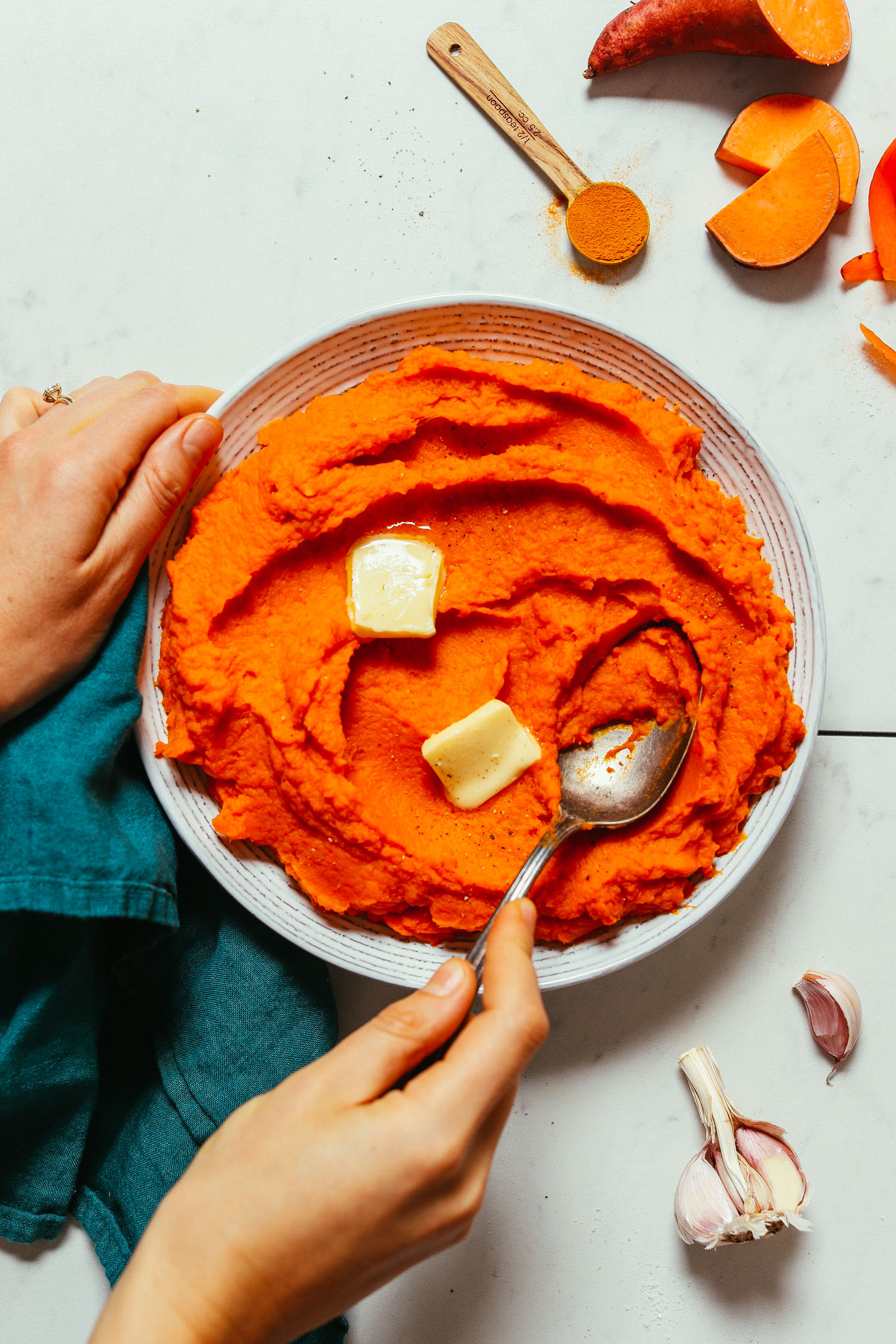 Bowl of Savory Mashed Sweet Potatoes and Carrots made with garlic and turmeric