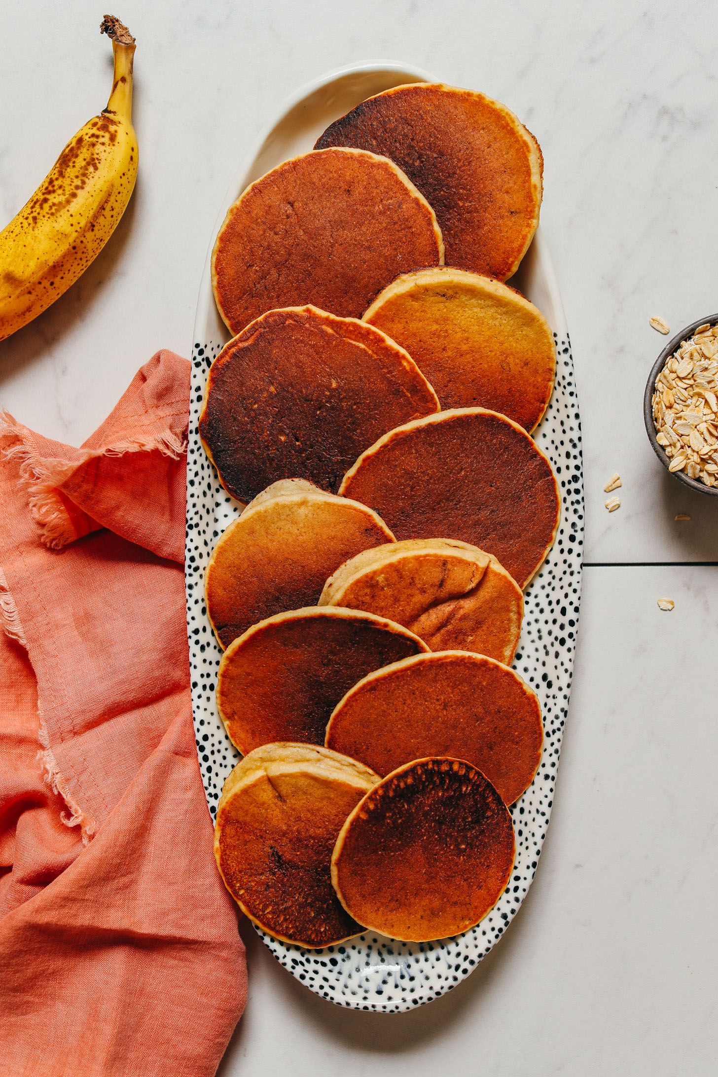 Platter filled with Banana Pancakes made with oats