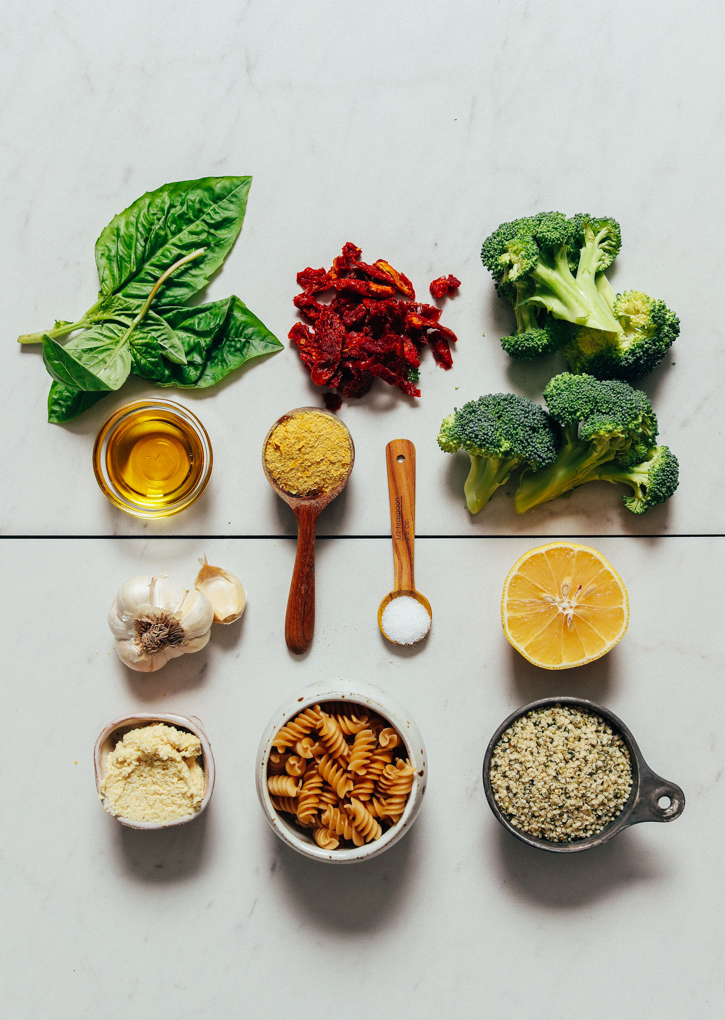 Broccoli, sun-dried tomatoes, basil, and other ingredients for making our easy Gluten-Free Pasta Salad recipe