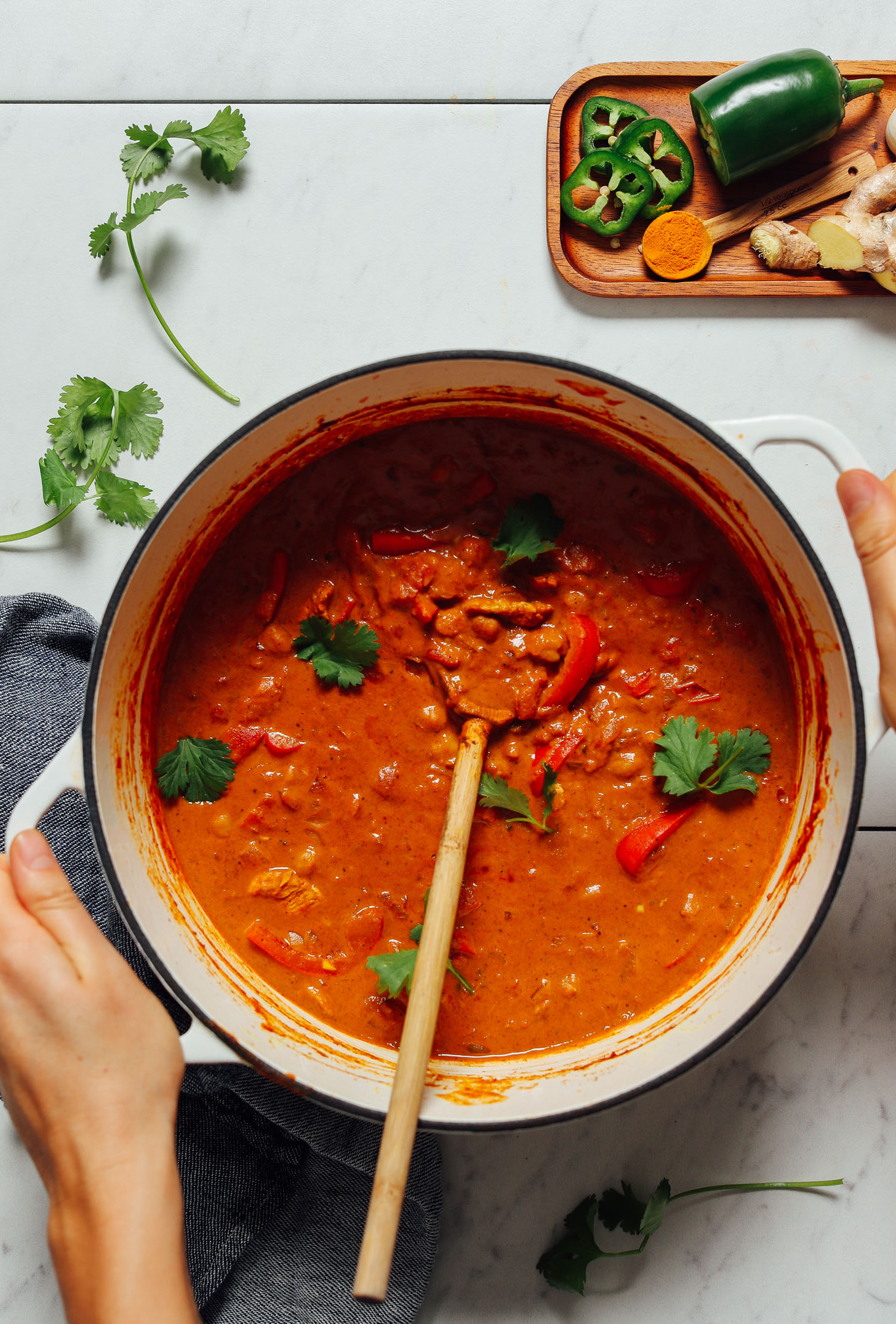 Pot of Tikka Masala topped with fresh cilantro