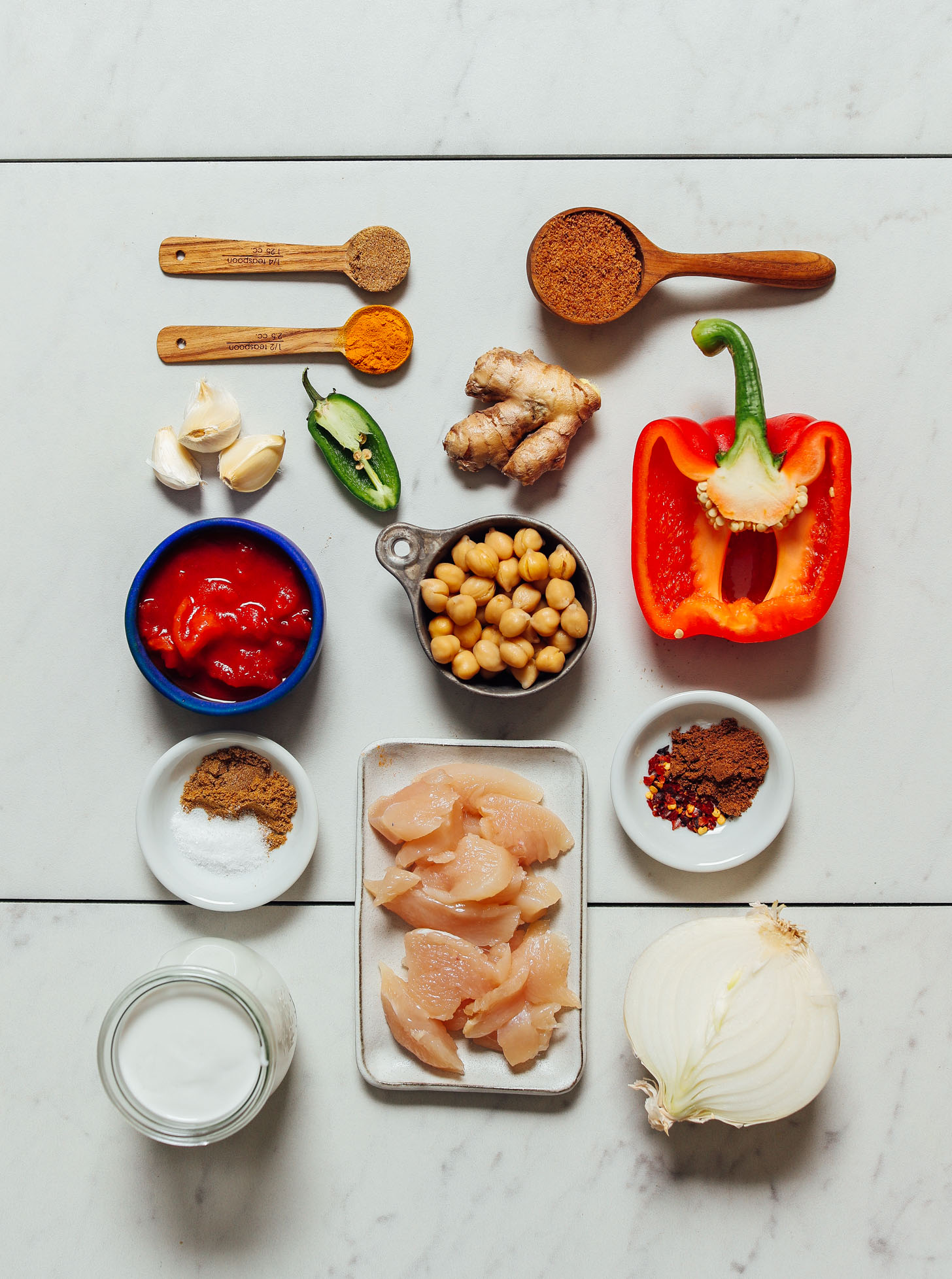 Chickpeas, chicken, bell pepper, onion, spices, and other ingredients for making our 1-Pot Tikka Masala recipe