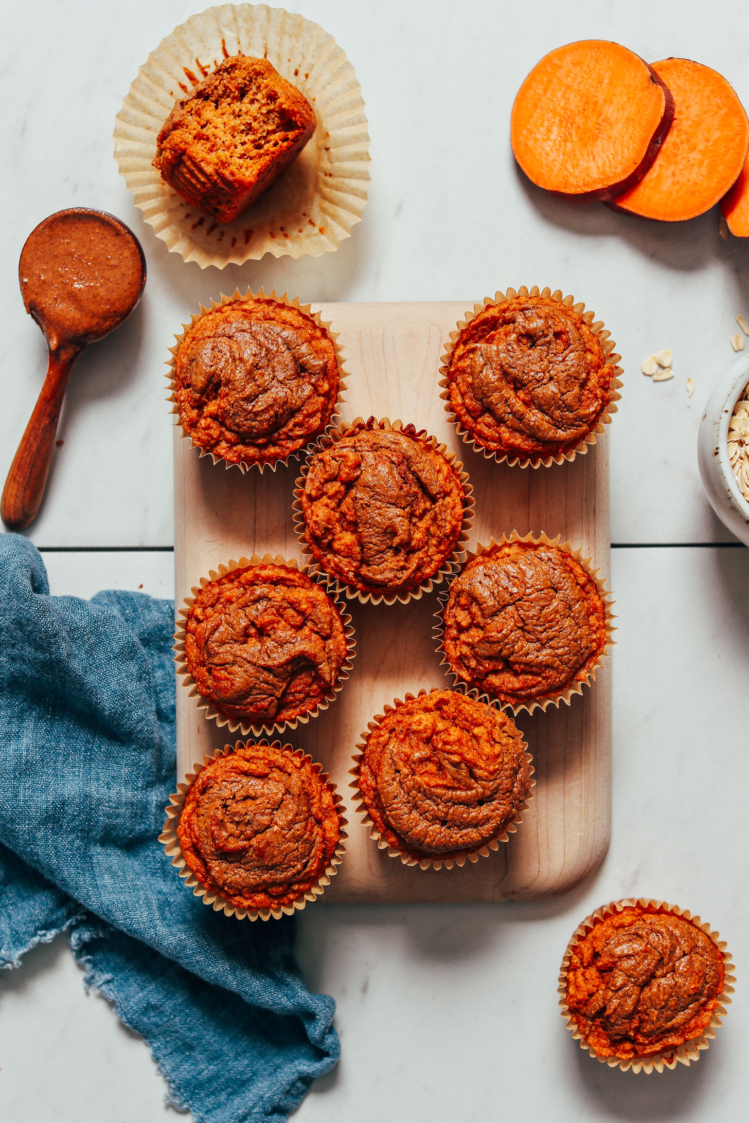 Batch of our Almond Butter Sweet Potato Muffins on a cutting board