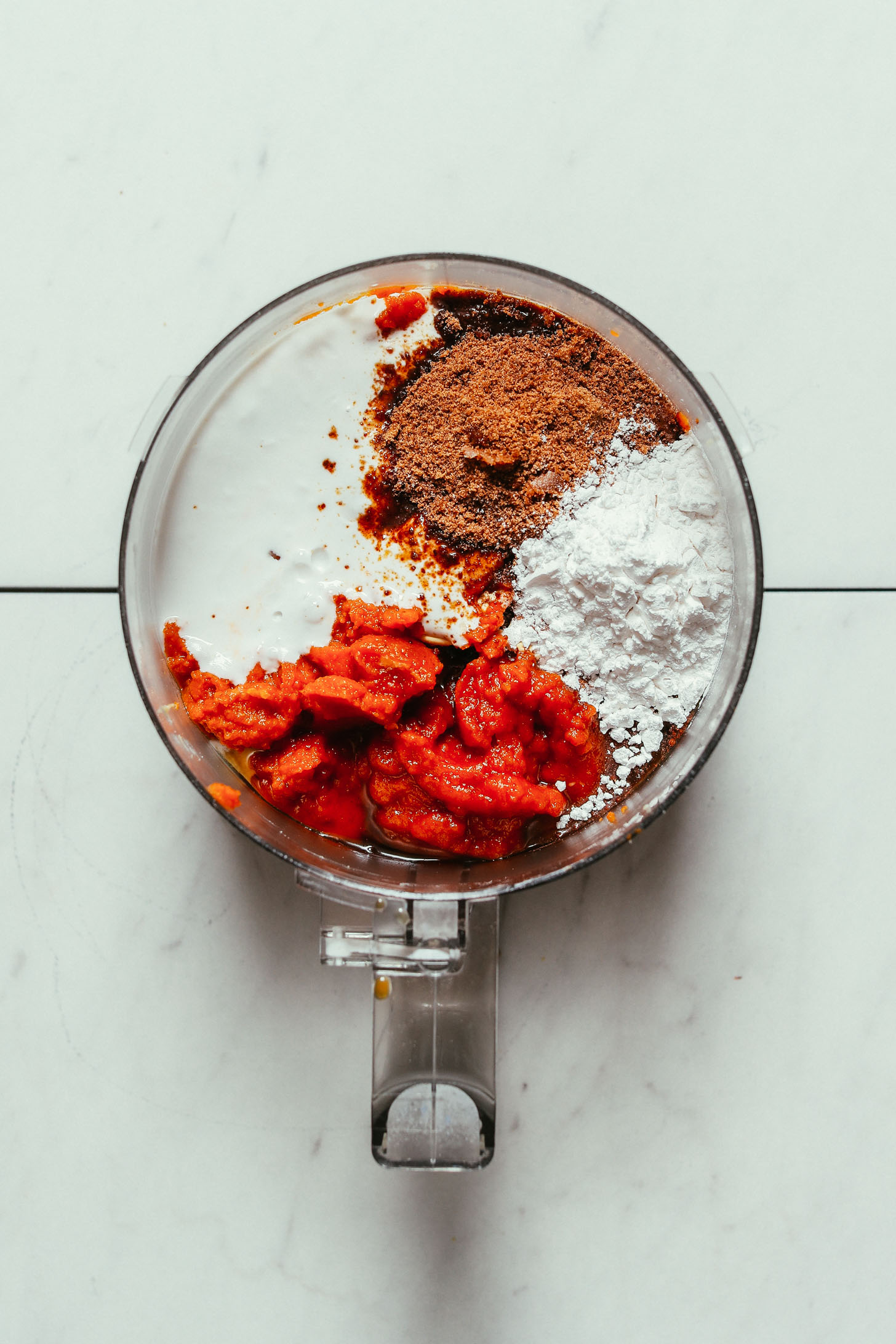 Food processor with ingredients for making our Pumpkin Pie recipe