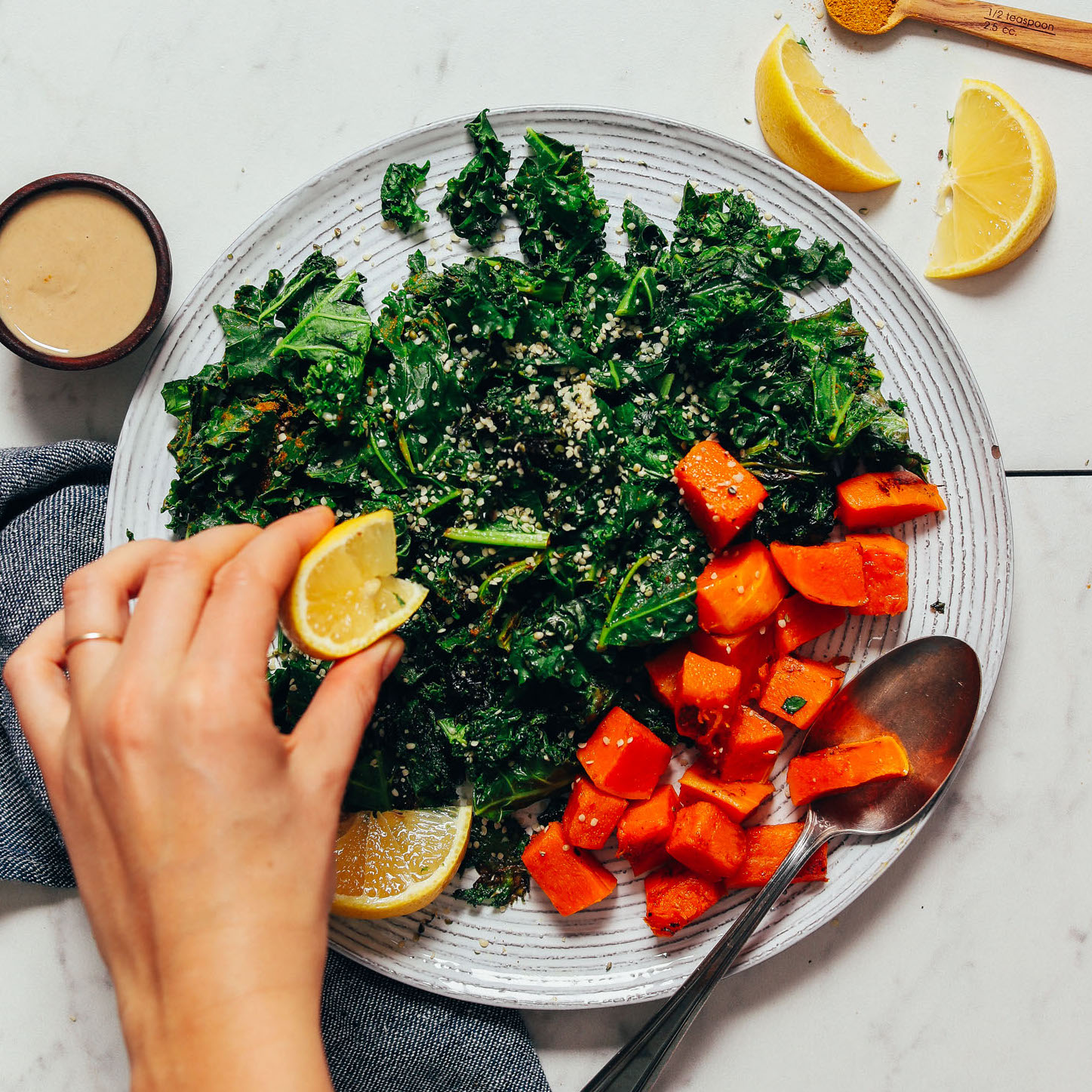 Squeeze a lemon wedge over sautéed kale