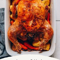 Pan of roasted vegetable and chicken made with lemon and rosemary