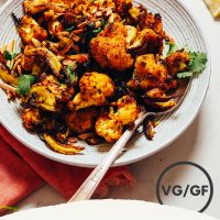 Bowl of our Quick Crispy Cauliflower made with curry powder and almonds