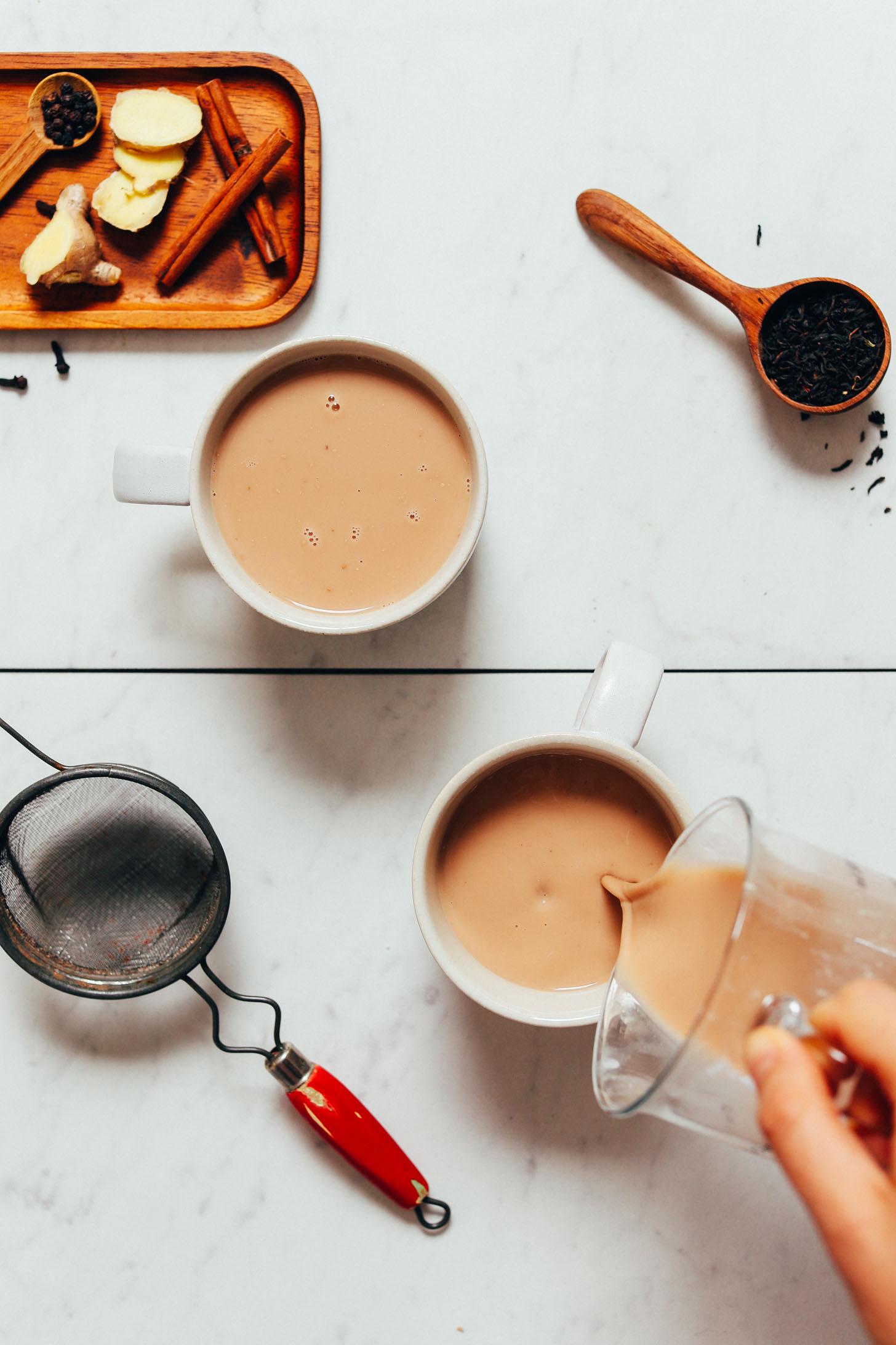 Pouring mugs of dairy-free Masala Chai