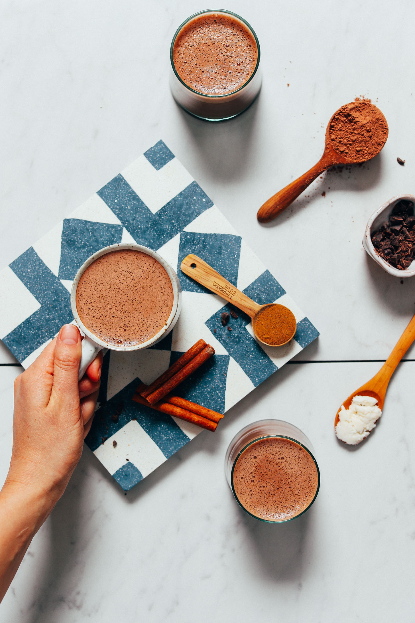 Picking up a mug of our low sugar Adaptogenic Hot Chocolate recipe