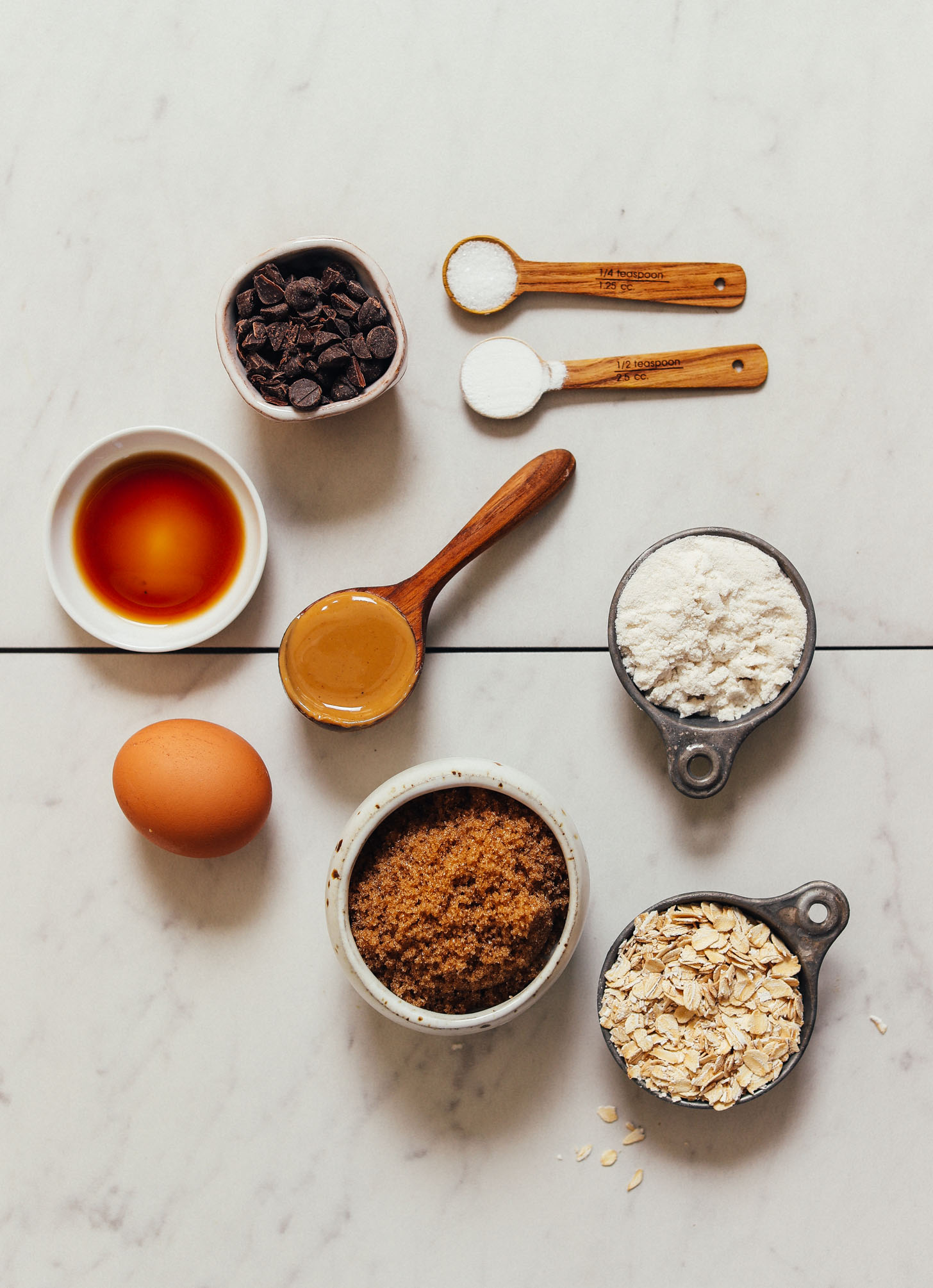 Oats, brown sugar, gluten-free four, natural peanut butter, egg, and other ingredients for making our Peanut Butter Chocolate Chip Cookies recipe