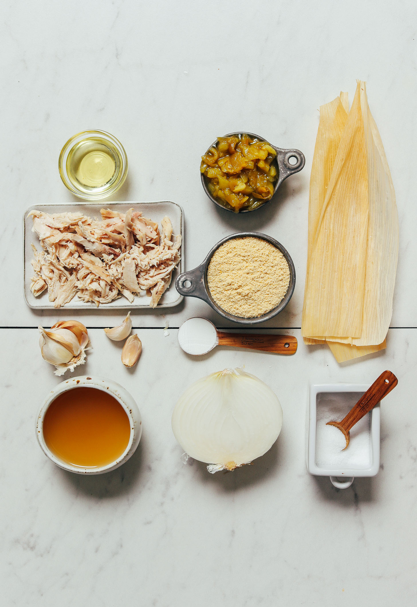 Shredded chicken, masa harina, and other ingredients for making our homemade Chicken Tamales recipe