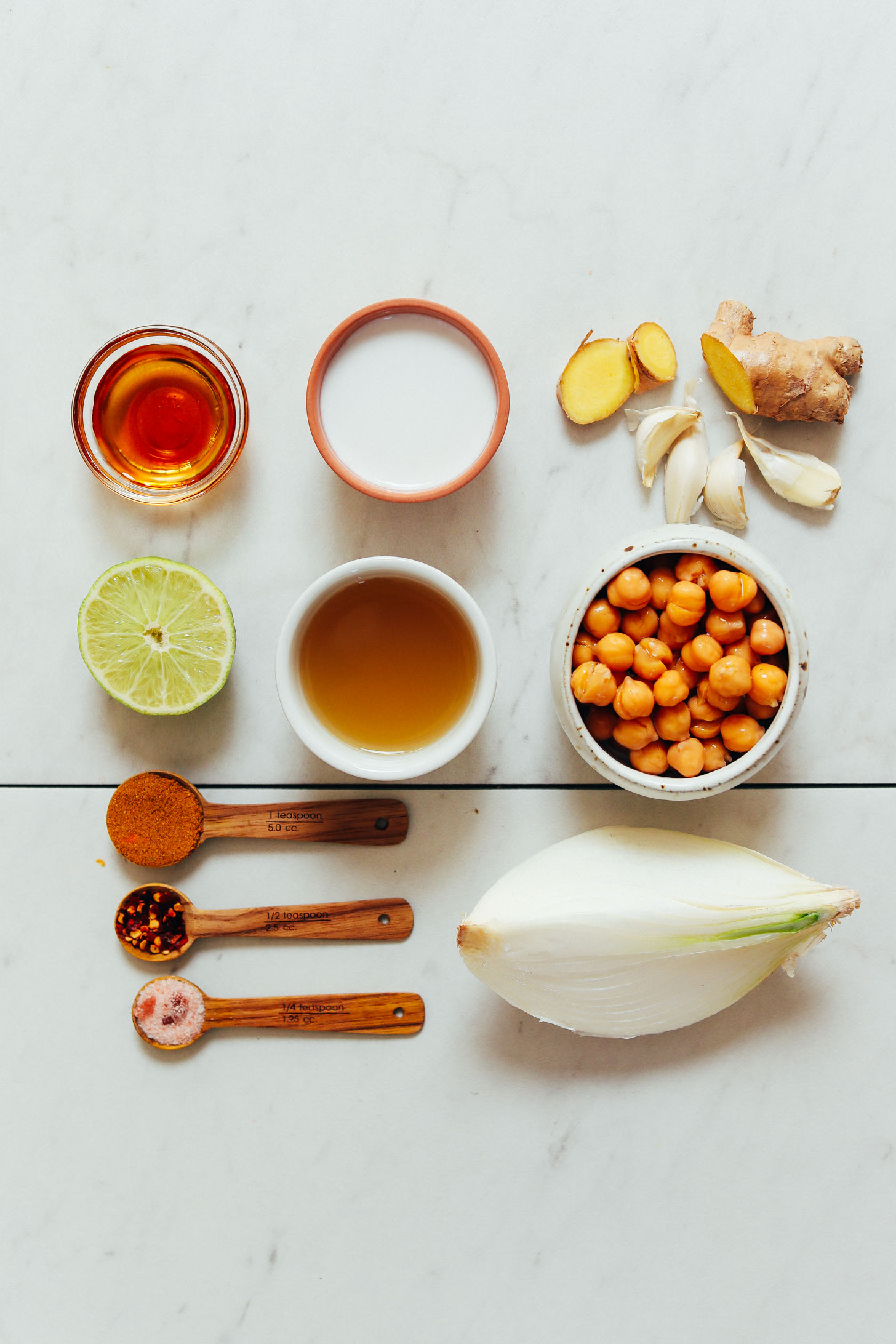 Ginger, garlic, chickpeas, onion, and spices for making Creamy Curried Chickpea Soup