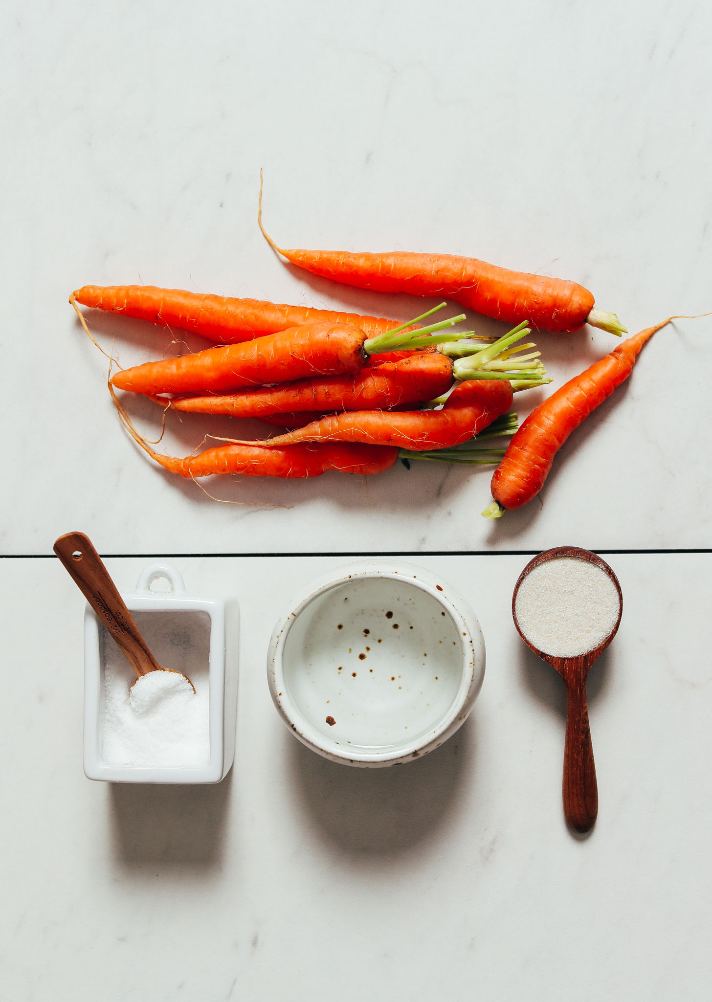 Carrots, salt, sugar, and vinegar for making our Quick Pickled Carrots recipe