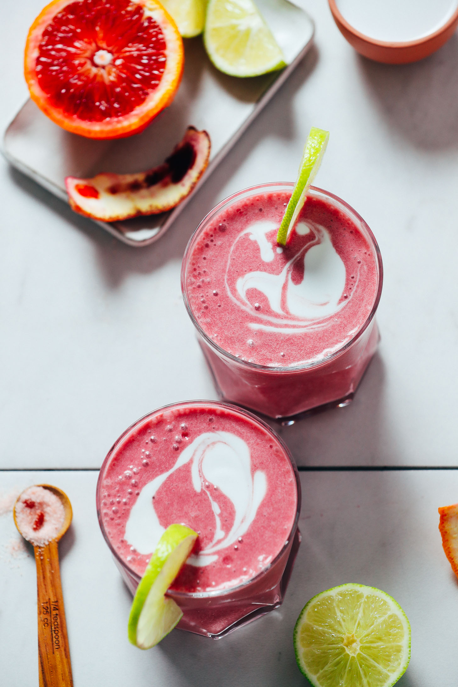 Orange Creamsicle Smoothies next to ingredients used to make them
