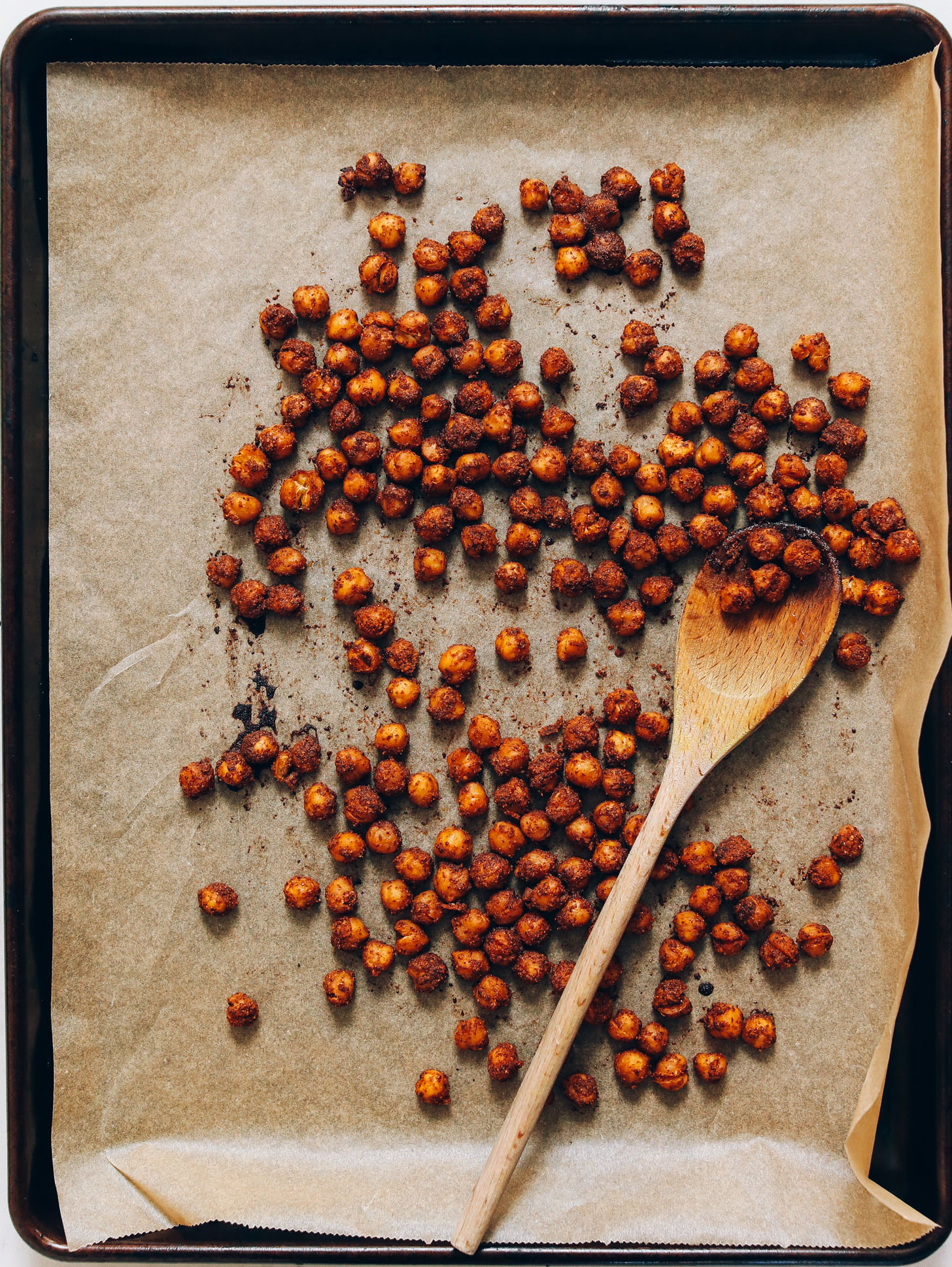 Parchment-lined baking sheet filled with Tandoori-Spiced Chickpeas