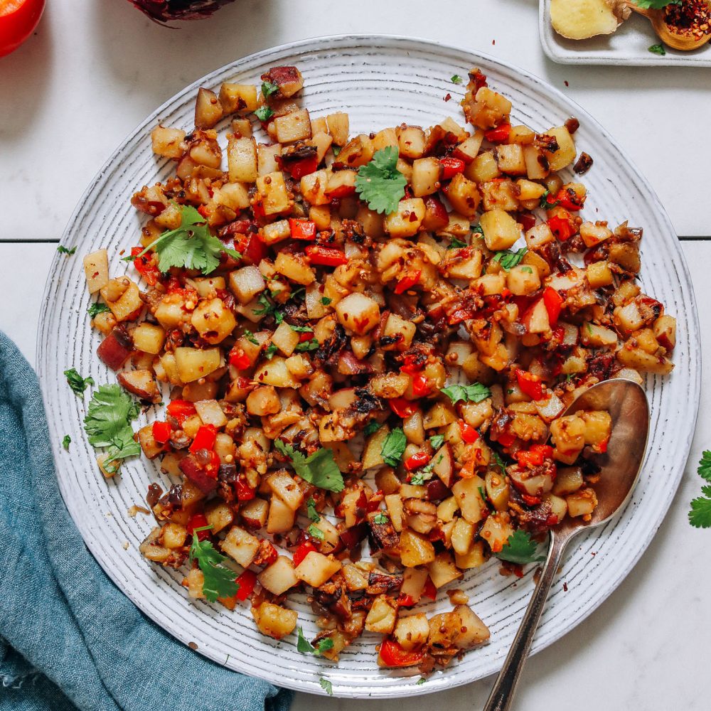 Spoon resting on a plate of our Potato Aloo Sabzi recipe