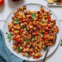 Spoon resting on a plate of our Potato Aloo Sabzi recipe