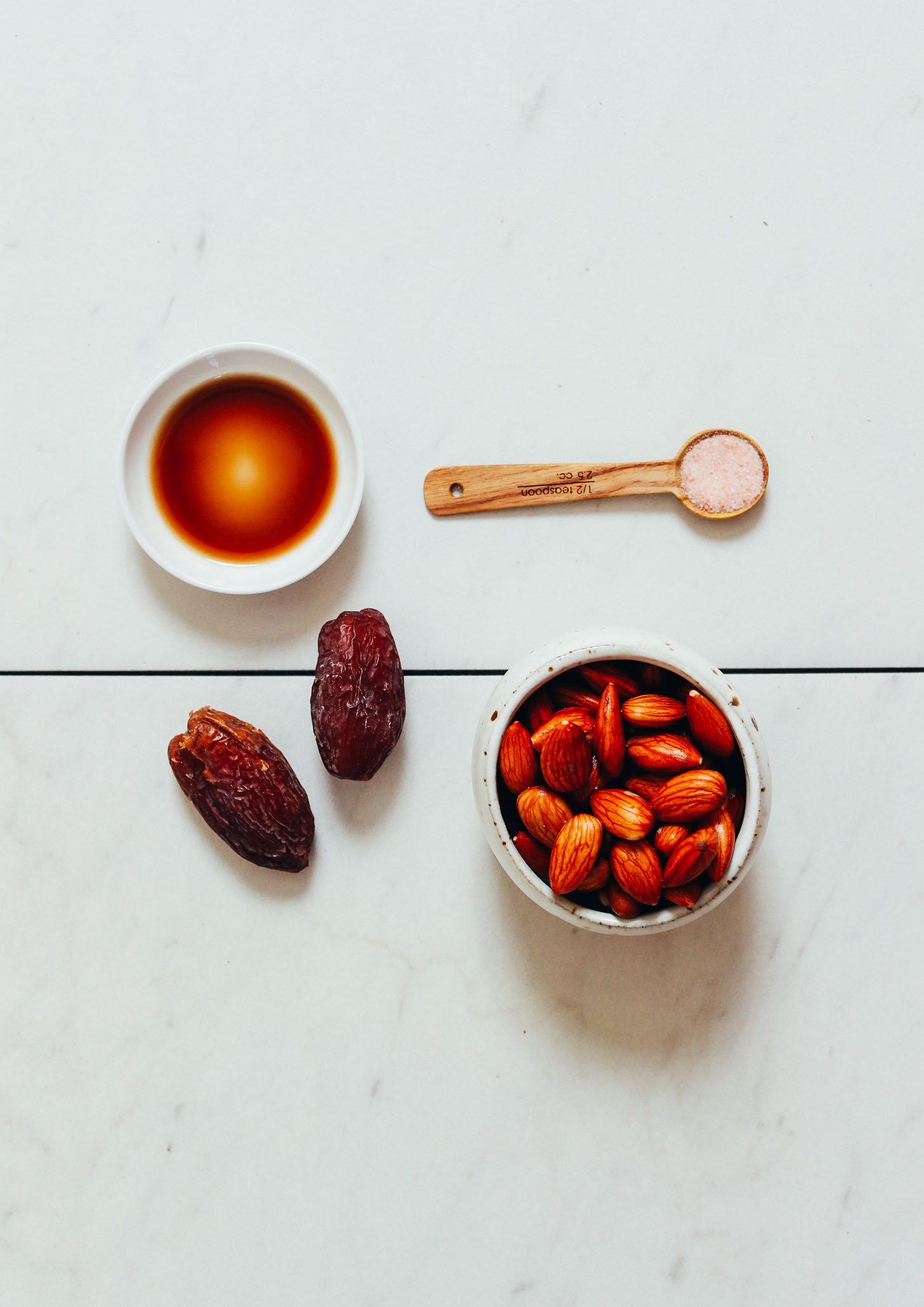 Almonds, dates, vanilla, and salt for making our Dairy-Free Coffee Creamer recipe