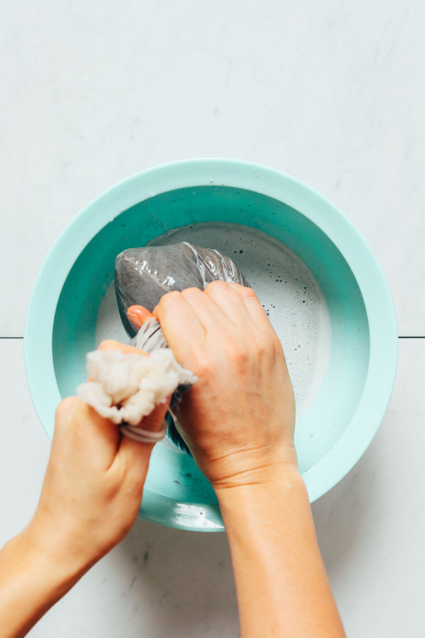 Using a nut milk bag to make Dairy-Free Black Sesame Milk