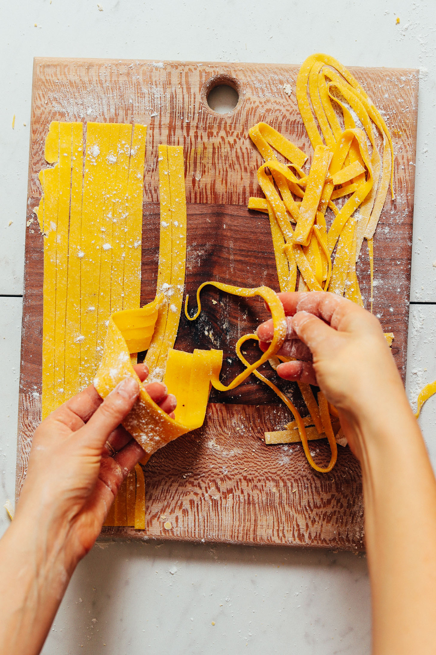 Picking up strips of our homemade Gluten Free Pasta recipe
