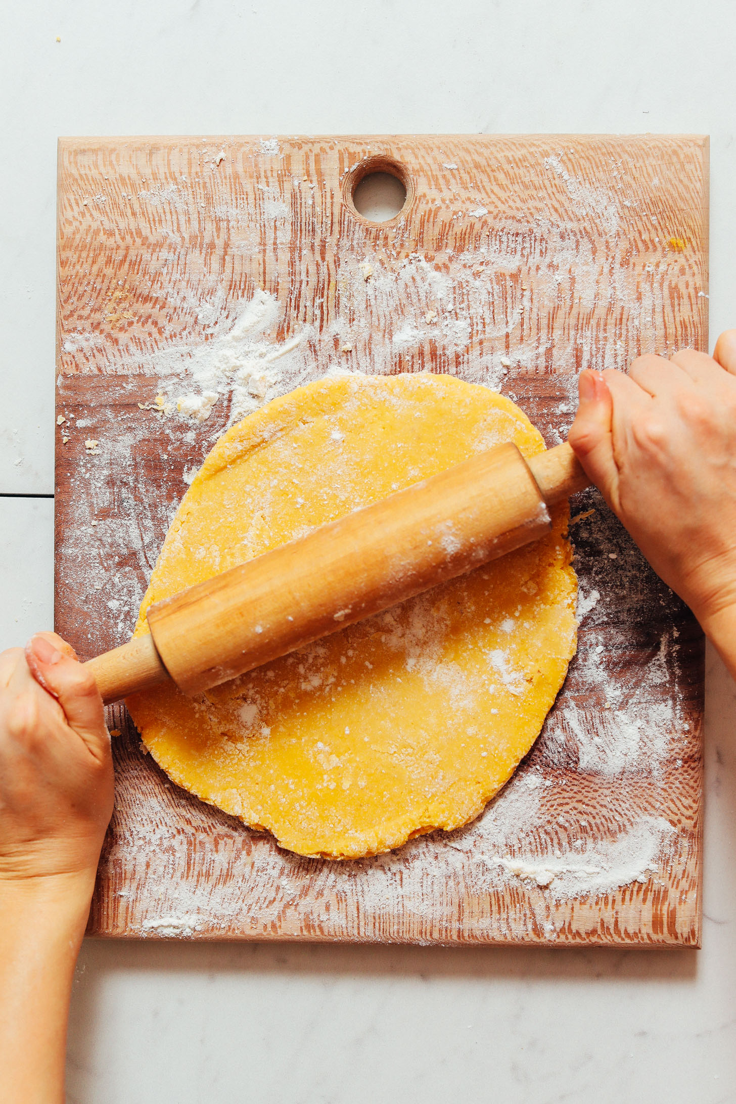 Rolling out the dough for our homemade Gluten Free Pasta