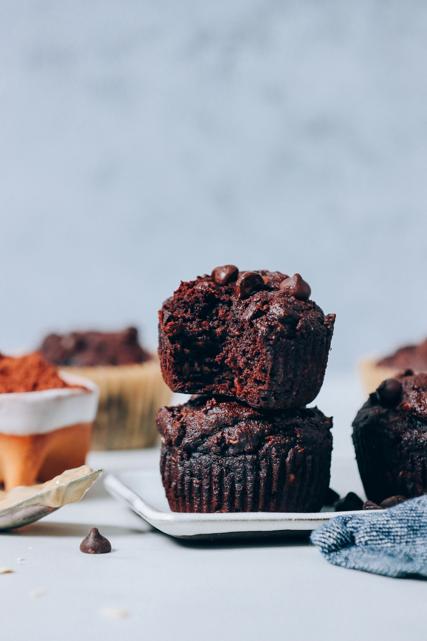 Stack of Banana Chocolate Muffins on a small tray