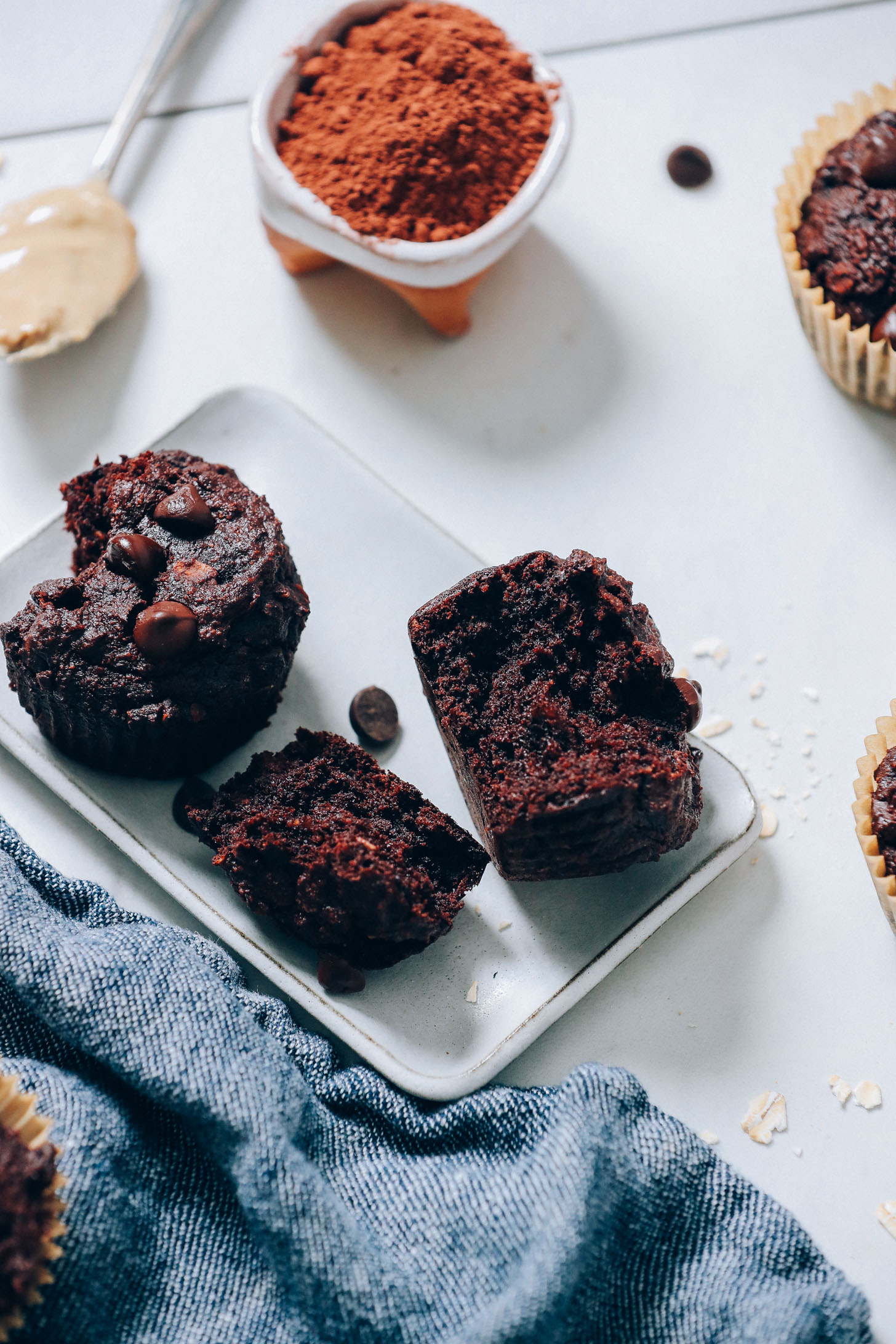 Tray of partially eaten Banana Chocolate Muffins made with gluten-free oats and almond flour