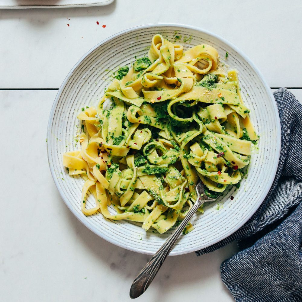 Fork resting in a plate of homemade Gluten-Free Pasta made with almond flour and eggs