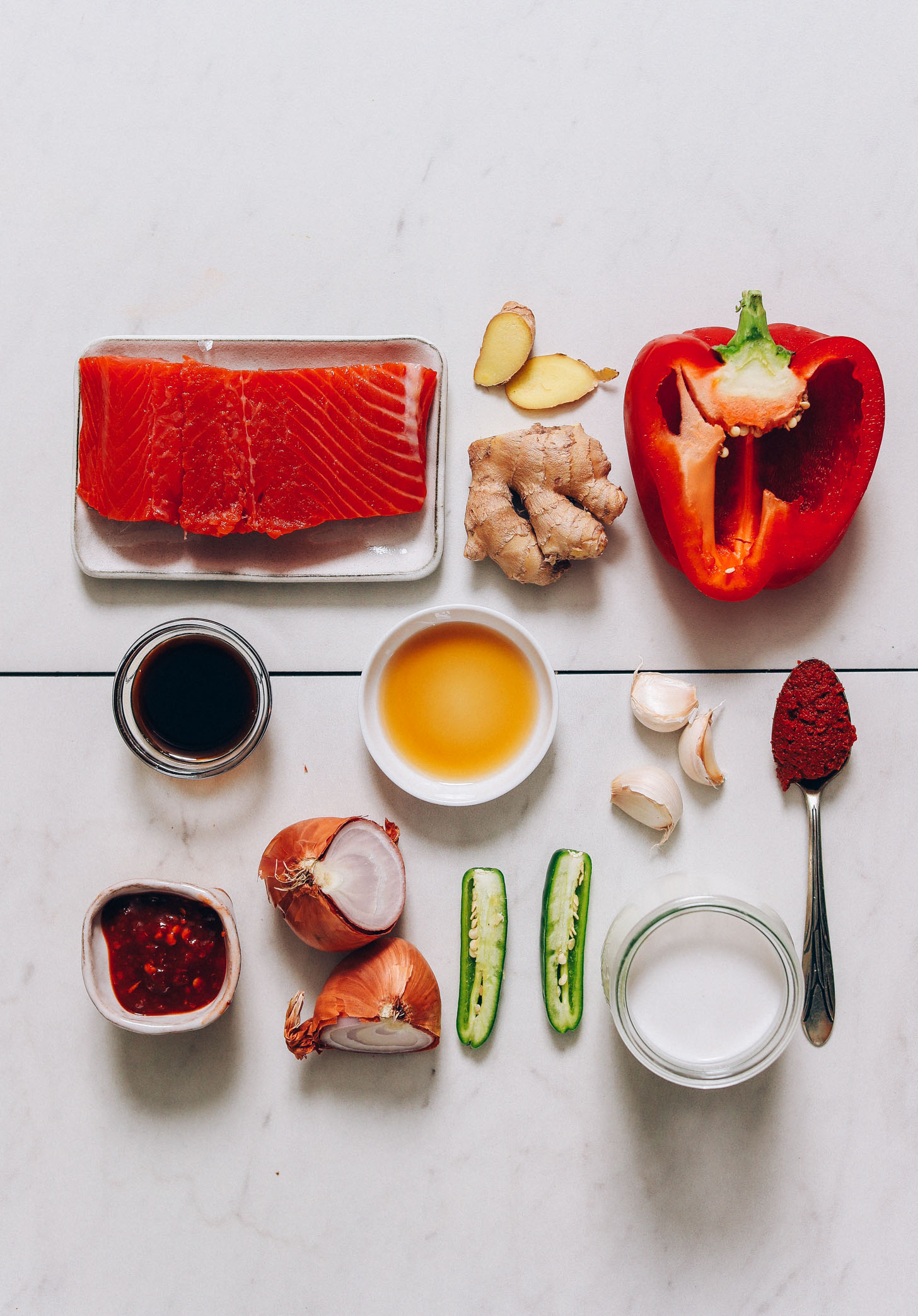 Salmon, ginger, red bell pepper, and other ingredients for making our Salmon Red Curry recipe
