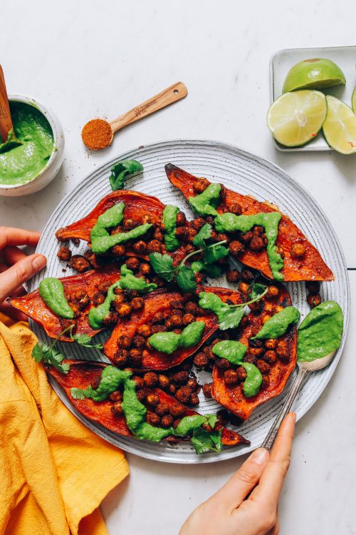 Plate of Stuffed Sweet Potatoes with Green Chutney and Tandoori Masala Chickpeas