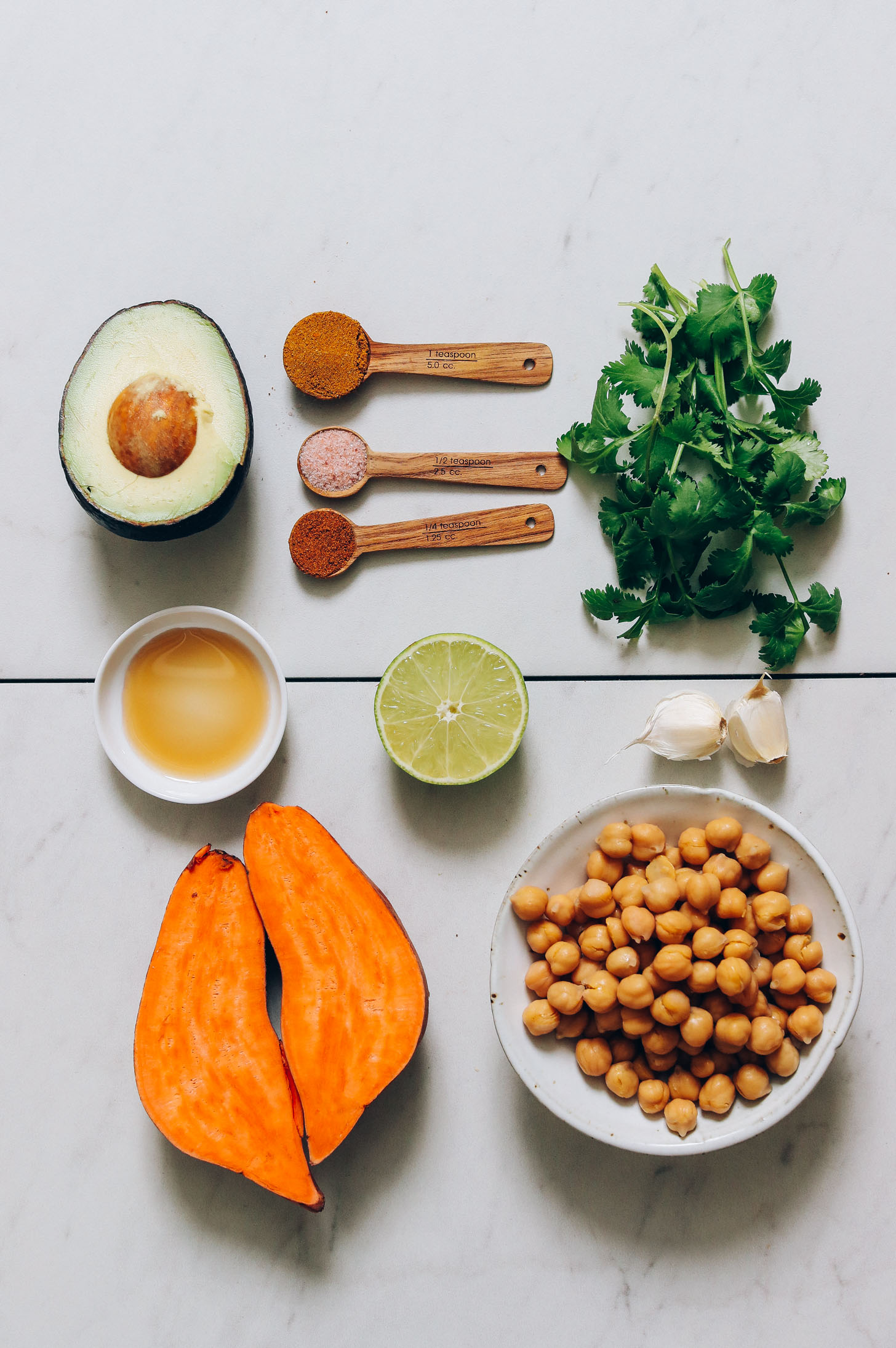Avocado, dried spices, maple syrup, cilantro, garlic, chickpeas, and sweet potatoes