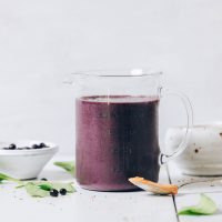 Blueberry Peanut Butter Smoothie in a liquid measuring cup