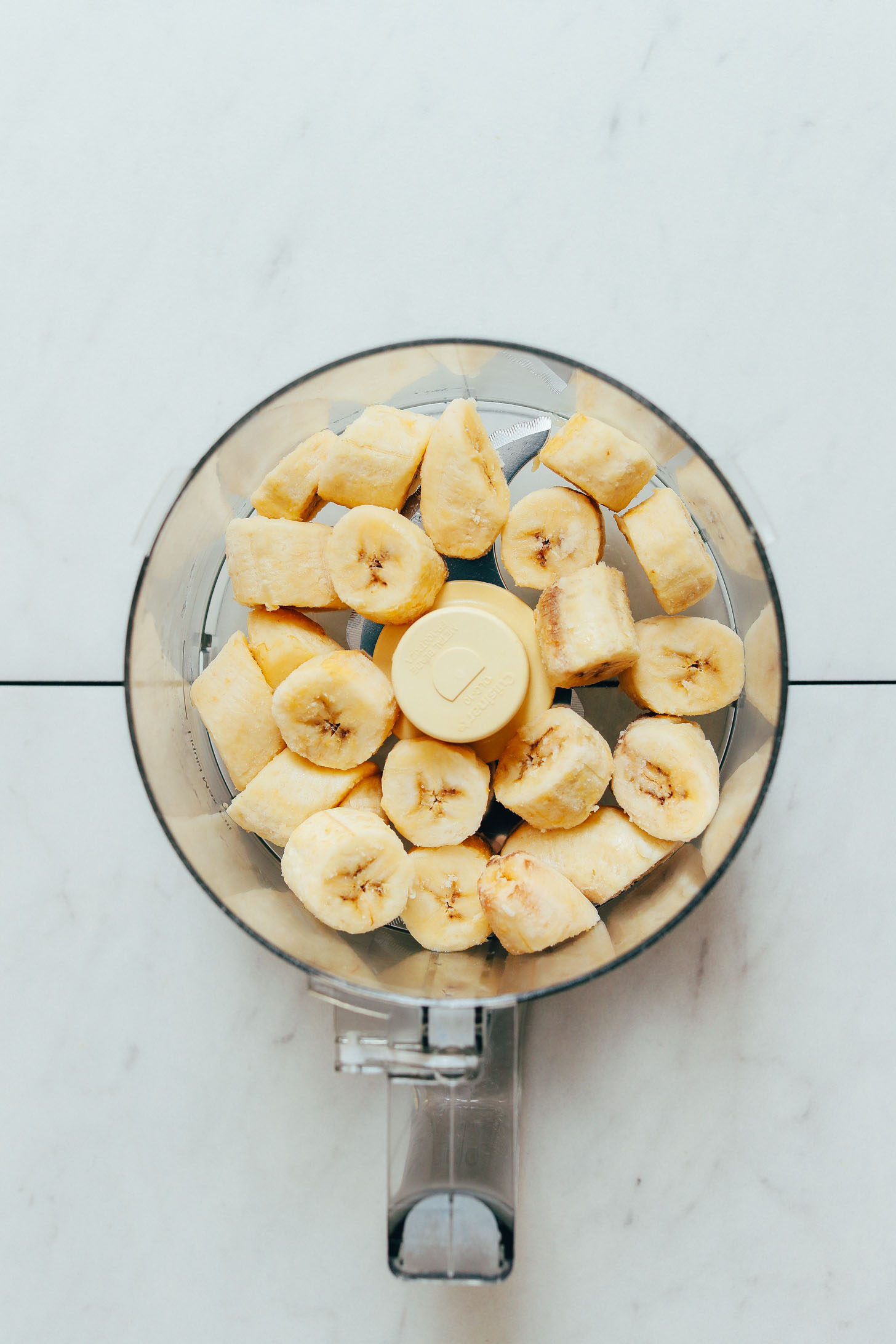 Food processor of frozen banana chunks for making Banana Ice Cream