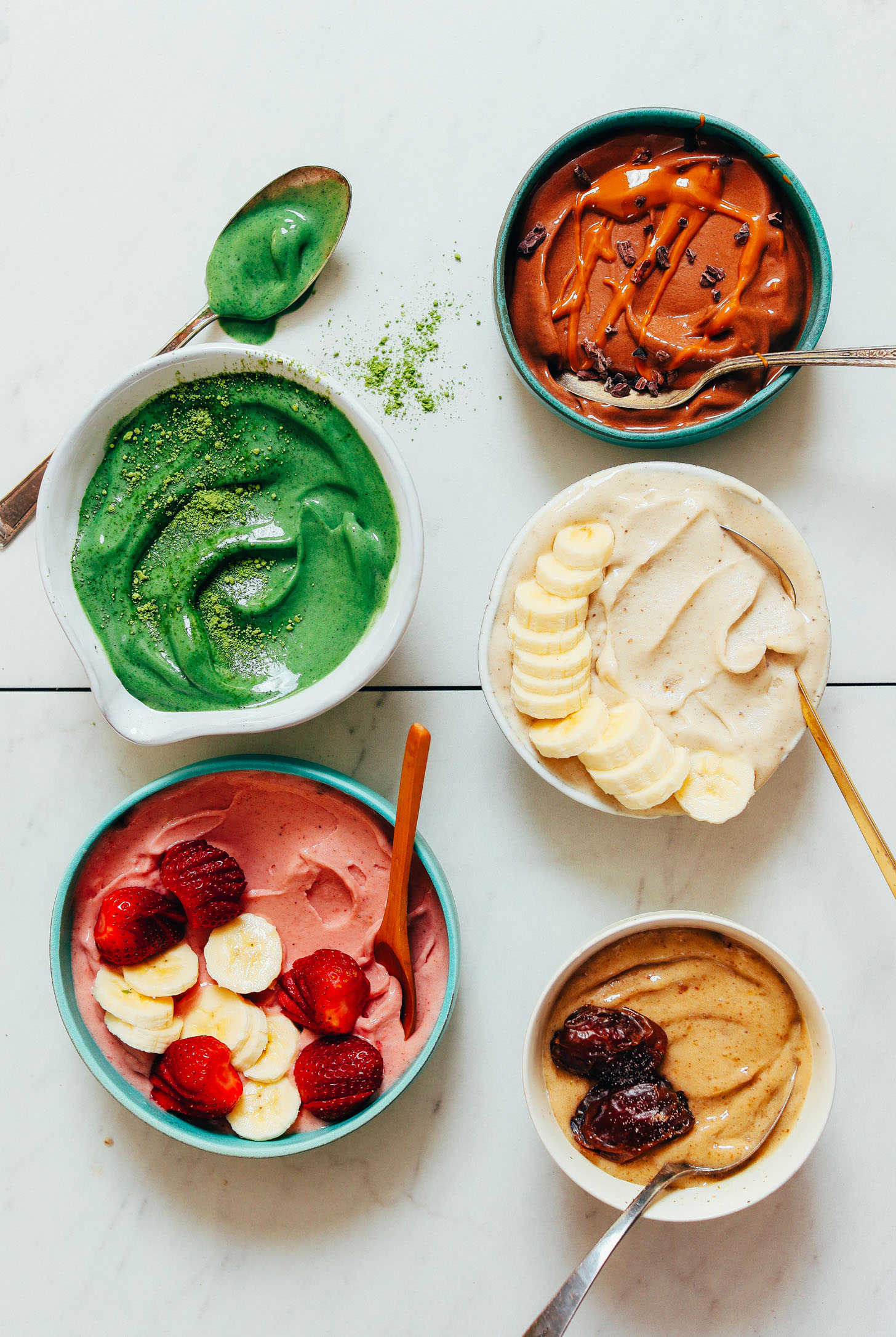 Bowls of Banana Nice Cream in different flavors