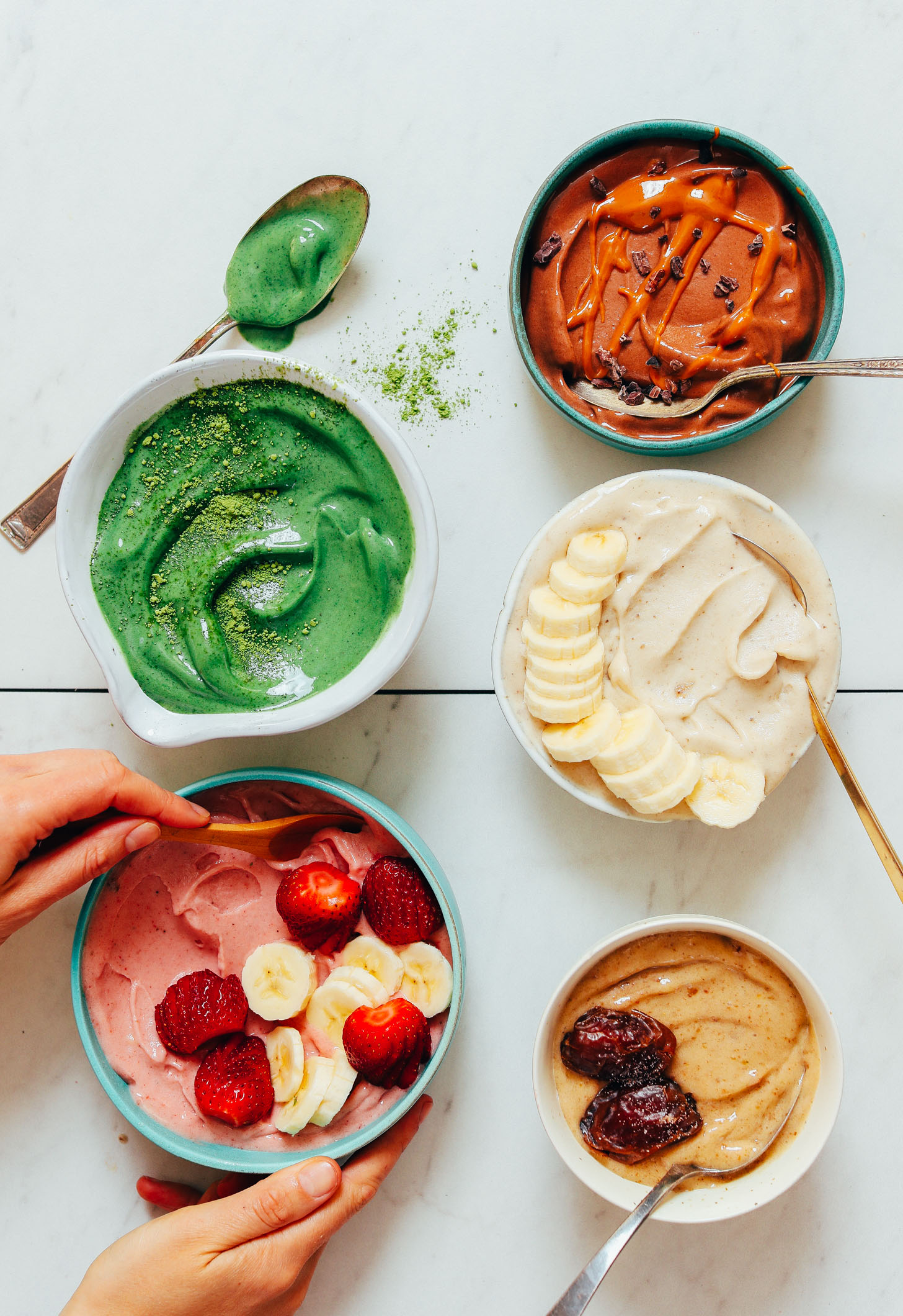 Bowl of strawberry, matcha, peanut butter, and salted caramel Banana Nice Cream