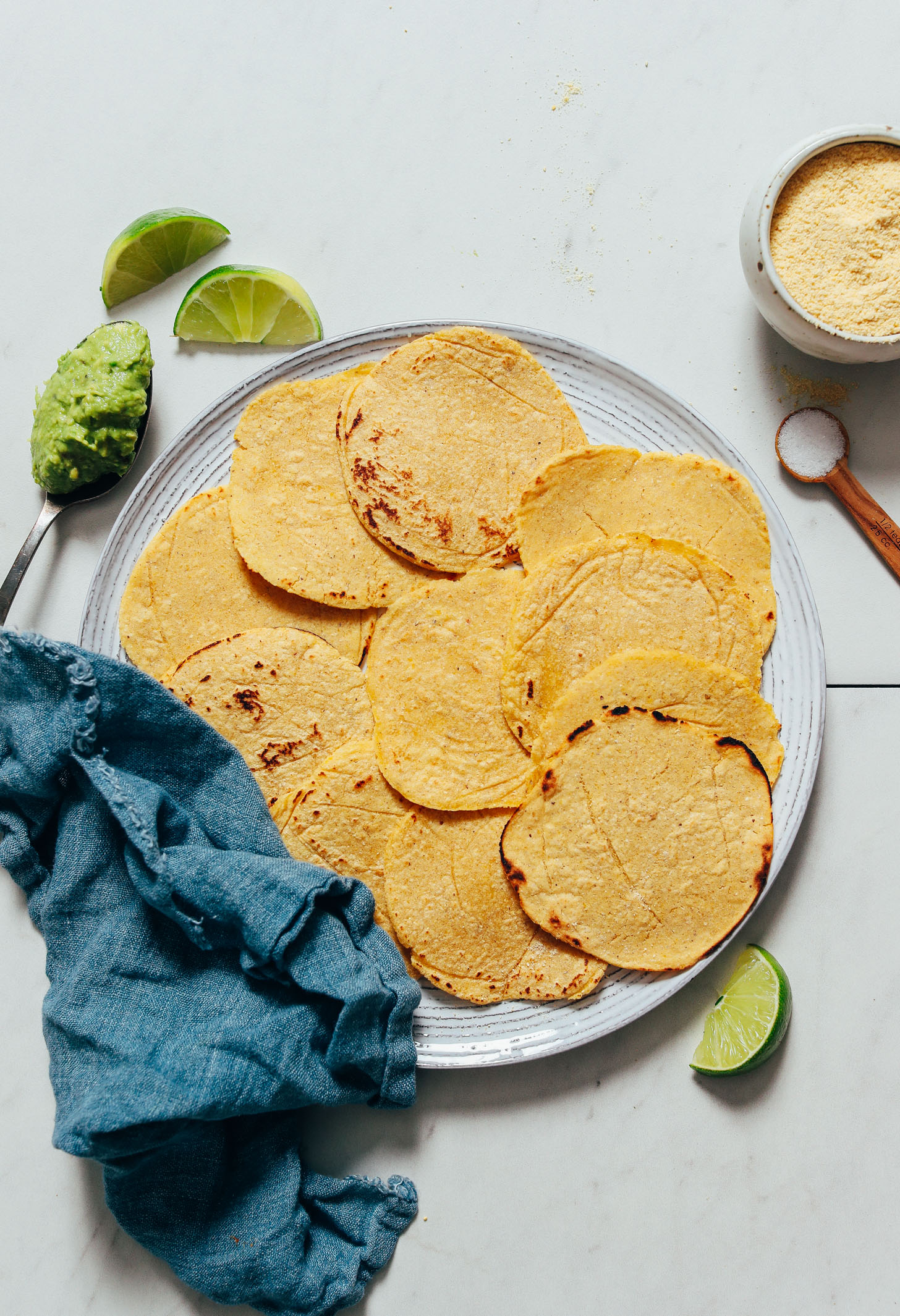 Plate of homemade corn tortillas made without a tortilla press