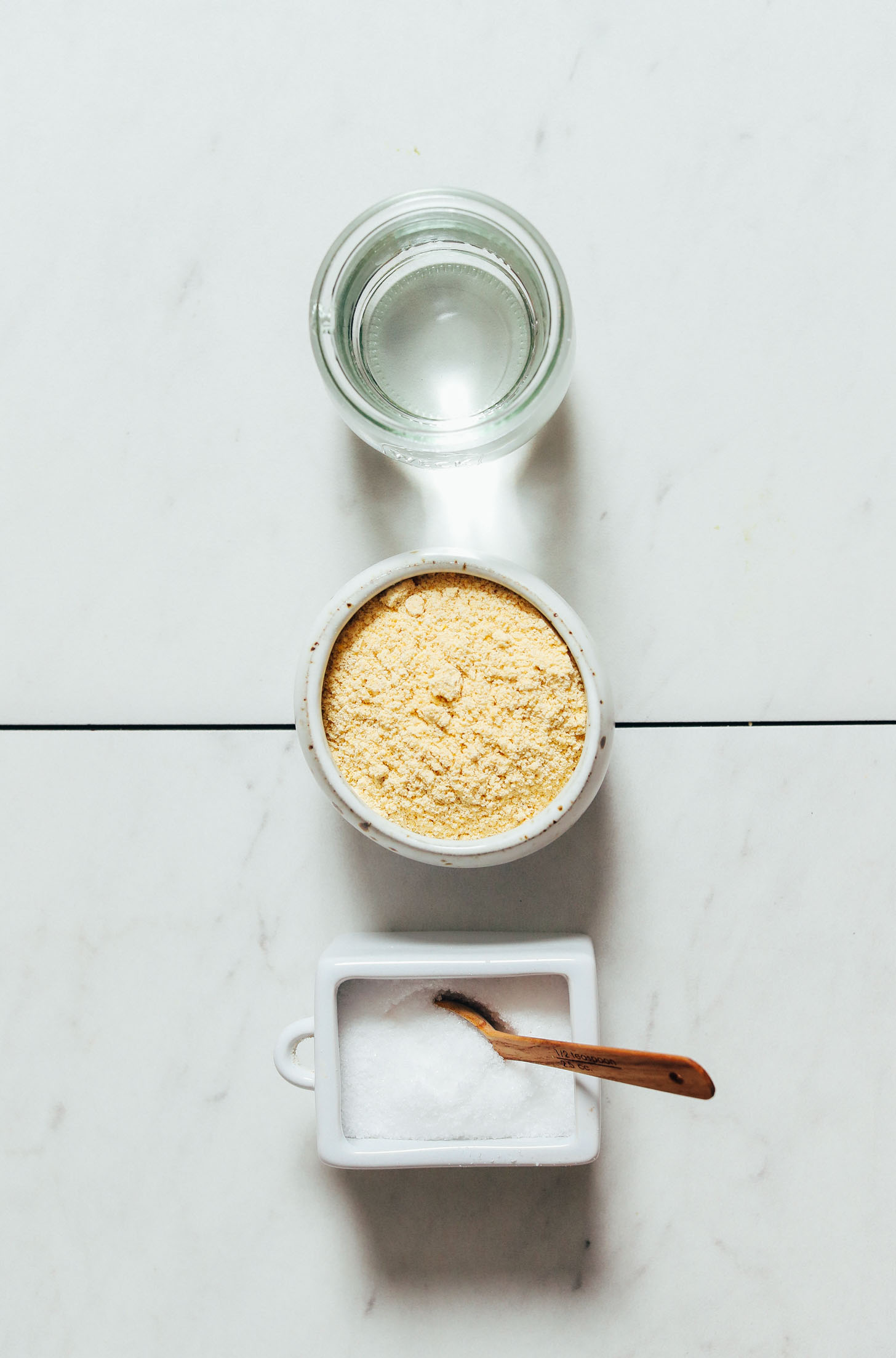 Water, masa harina, and sea salt for making homemade oil-free corn tortillas