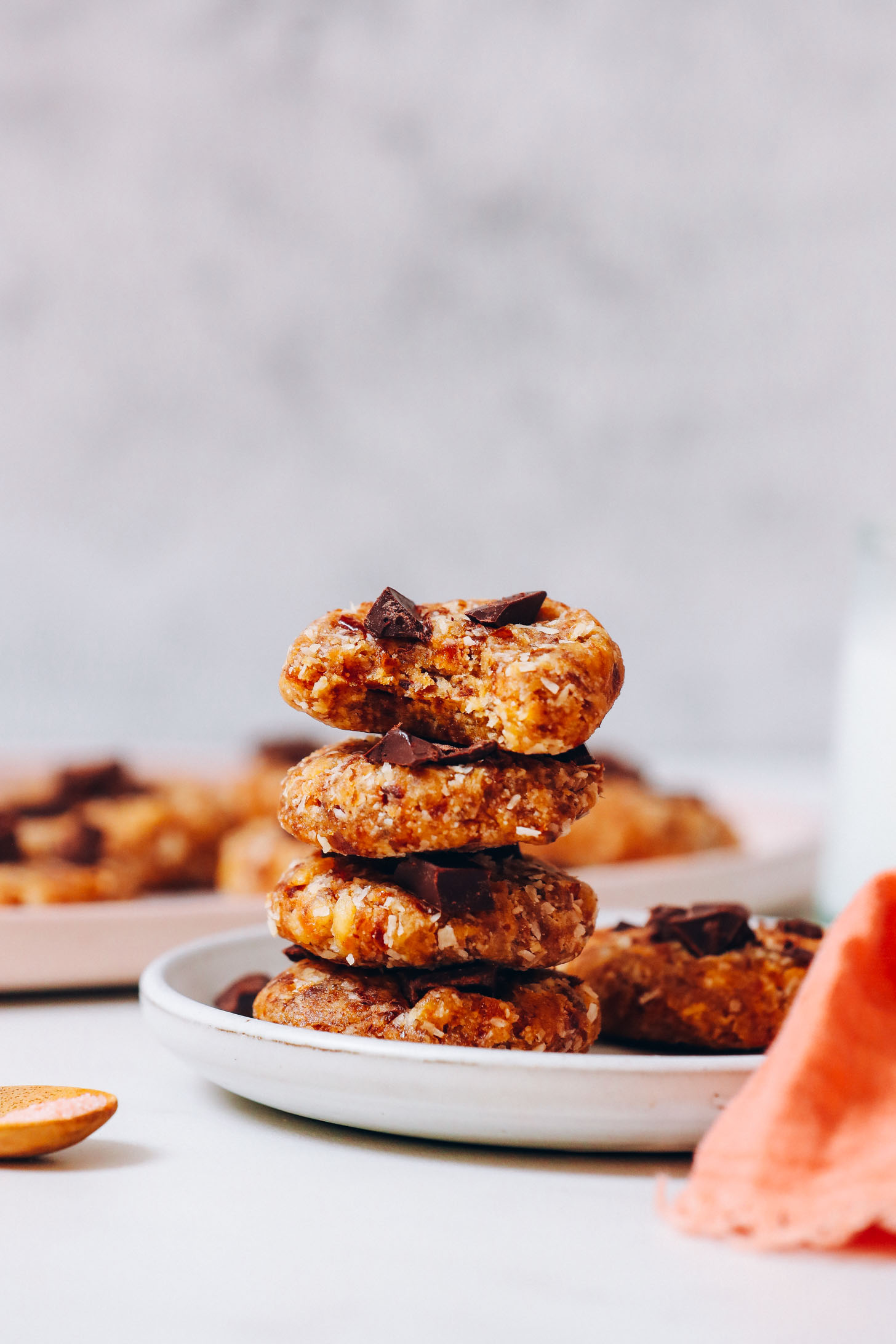 Stack of no-bake cookies studded with chocolate chunks