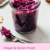 Jar and spoonful of our Gingery Apple Sauerkraut recipe