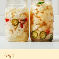Two jars of our Spicy Pickled Cauliflower (Escabeche)