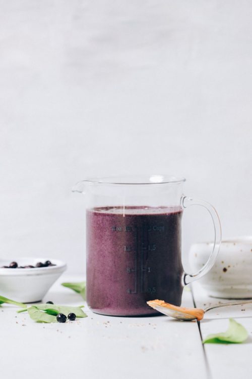Blueberry Peanut Butter Smoothie in a liquid measuring cup