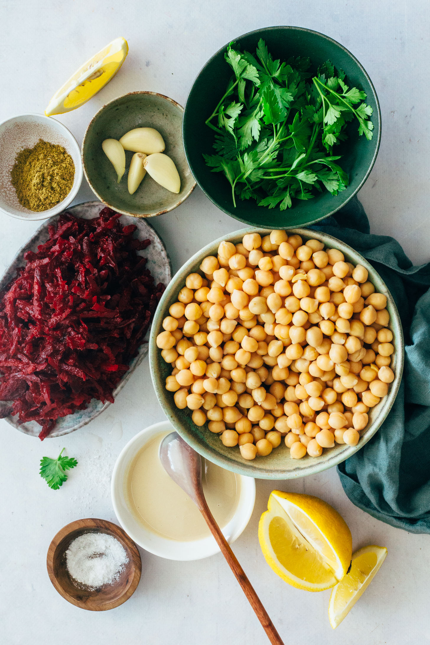 Shredded beets, garlic, parsley, lemon, salt, tahini, and chickpeas