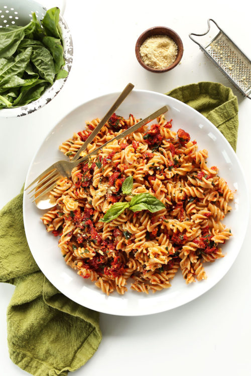 Plate of our Sun-Dried Tomato Pesto Pasta for a gluten-free vegan dinner