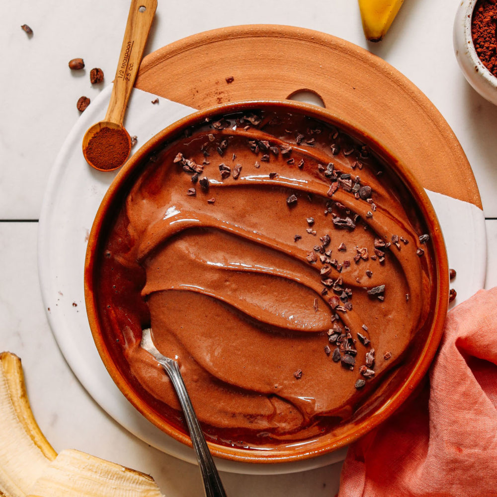 Vintage spoon in a wood bowl of Coffee Chocolate Banana Ice Cream