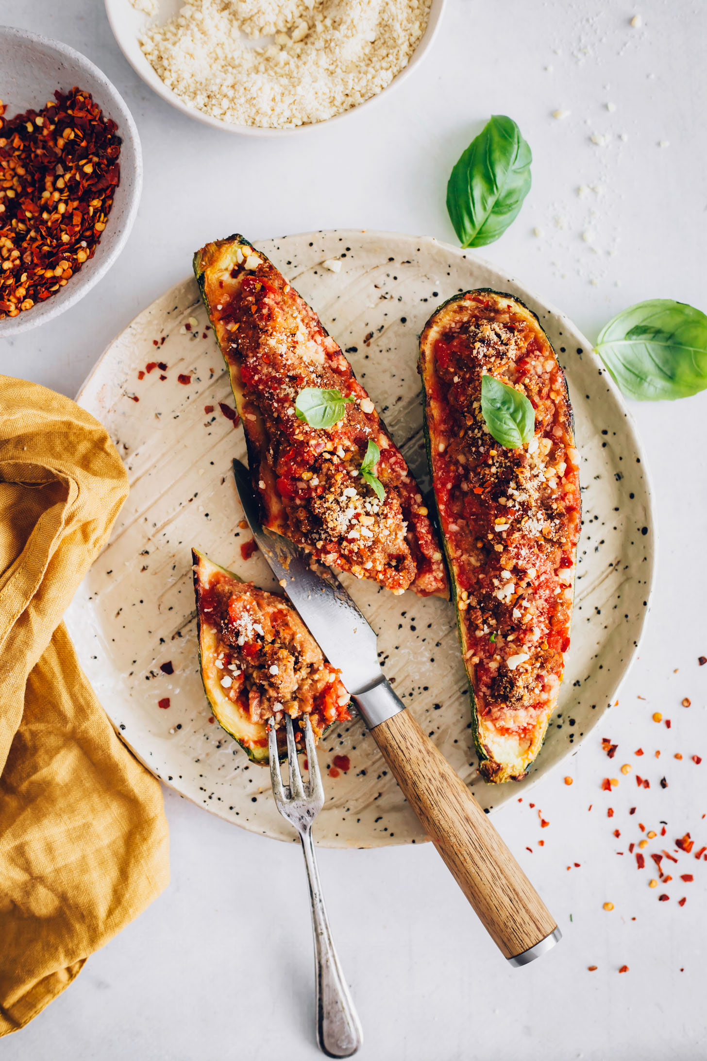 Fork and knife on a plate of Italian-Inspired Zucchini Boats