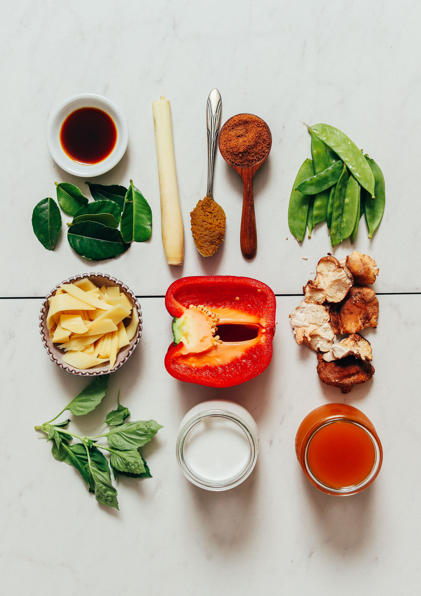 Coconut aminos, kaffir lime leaves, lemongrass, green curry paste, coconut sugar, snow peas, mushrooms, vegetable broth, bell pepper, basil, and bamboo shoots