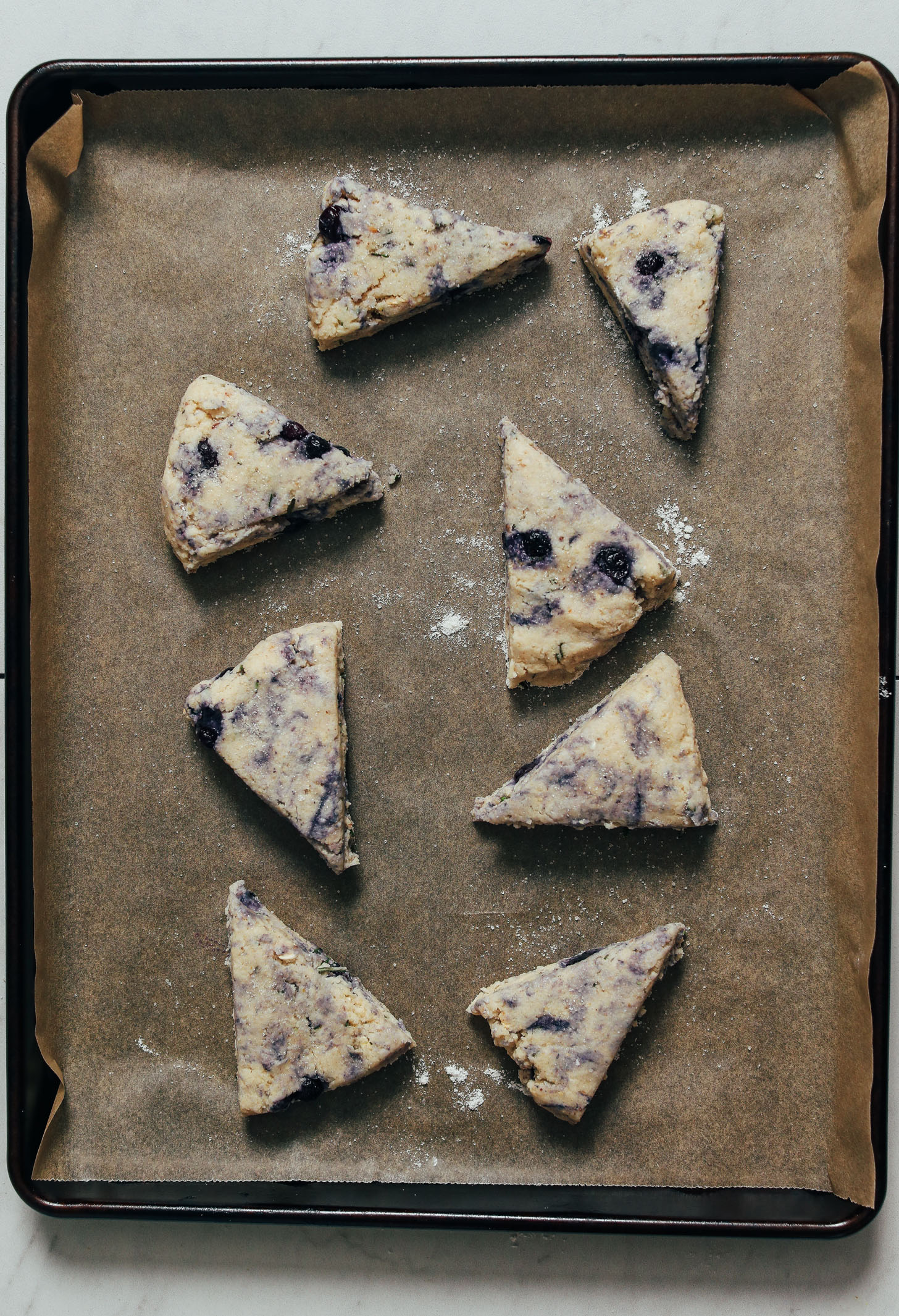 Baking sheet of unbaked Blueberry Scones ready to go in the oven