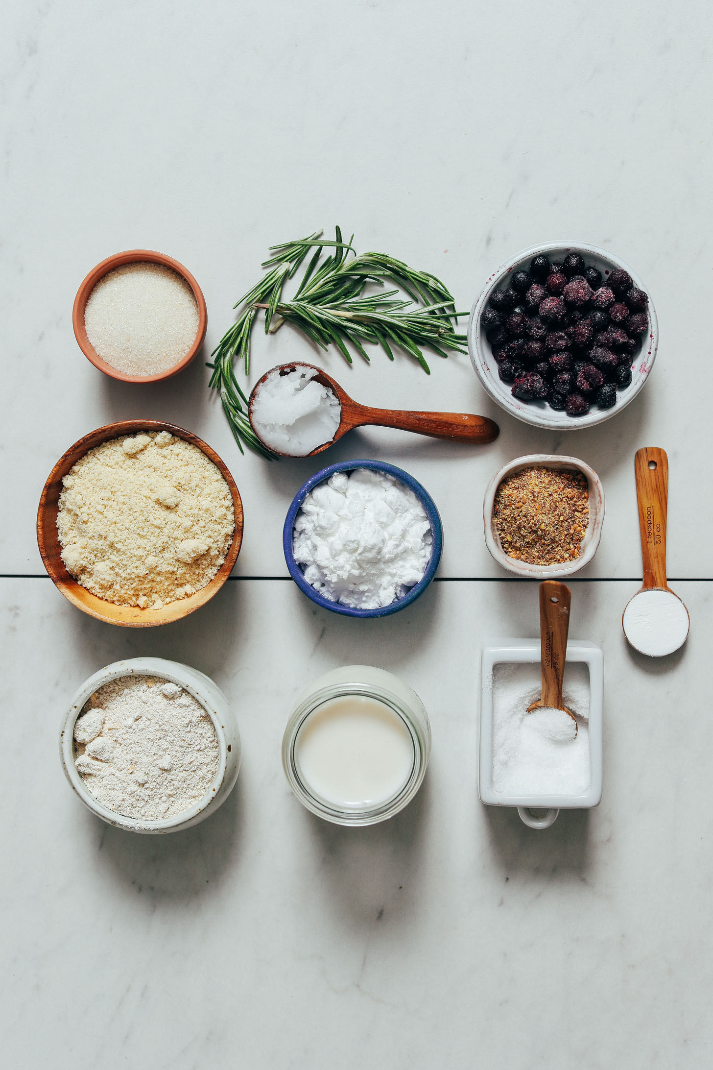 Dairy-free milk, gluten-free flours, coconut oil, flax, salt, rosemary, and wild blueberries